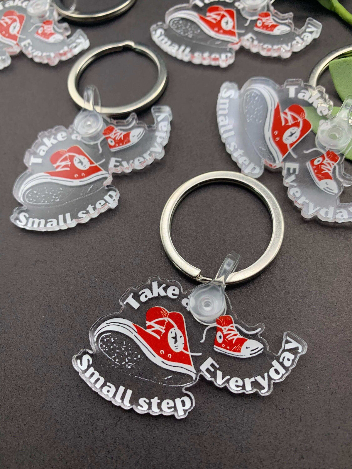 Converse high-top sneaker keychain by Winks Design Studio, LLC featuring detailed sneaker design and durable keyring attachment.