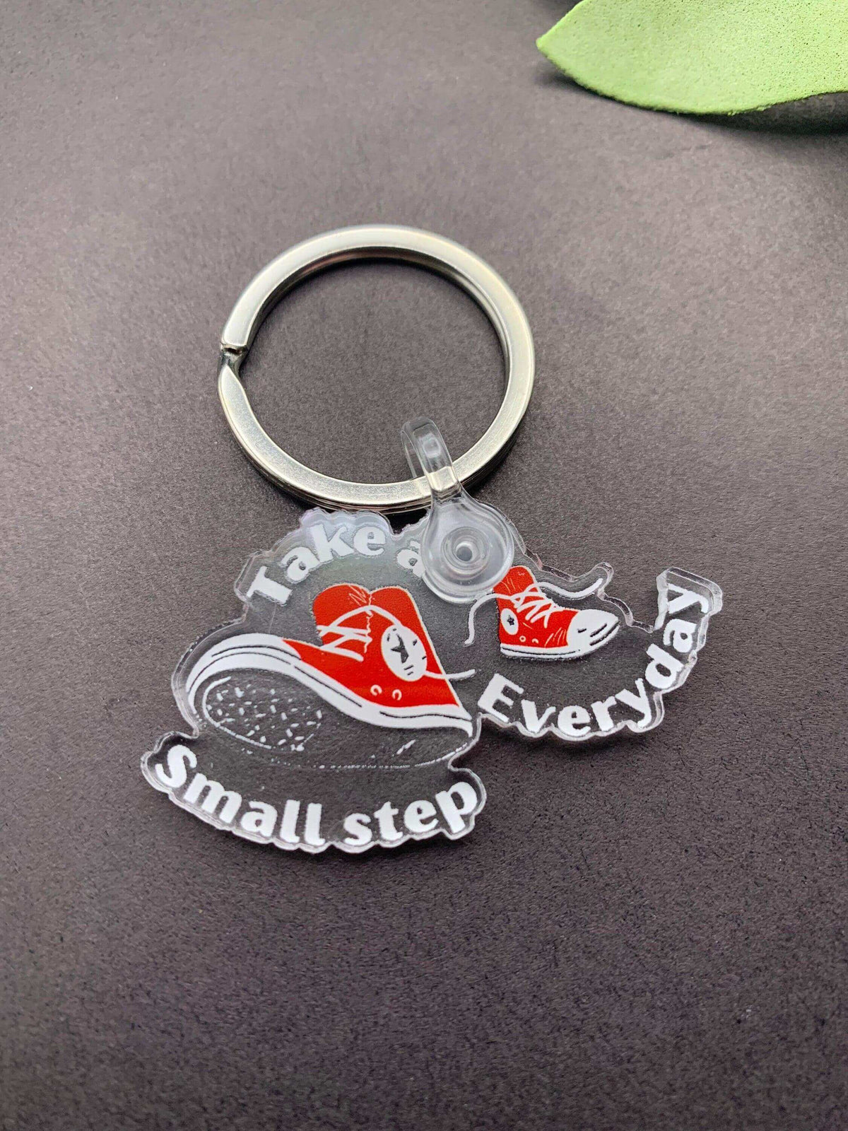 Converse Hightops sneaker keychain by Winks Design Studio, LLC, featuring detailed miniature sneaker design on keyring.