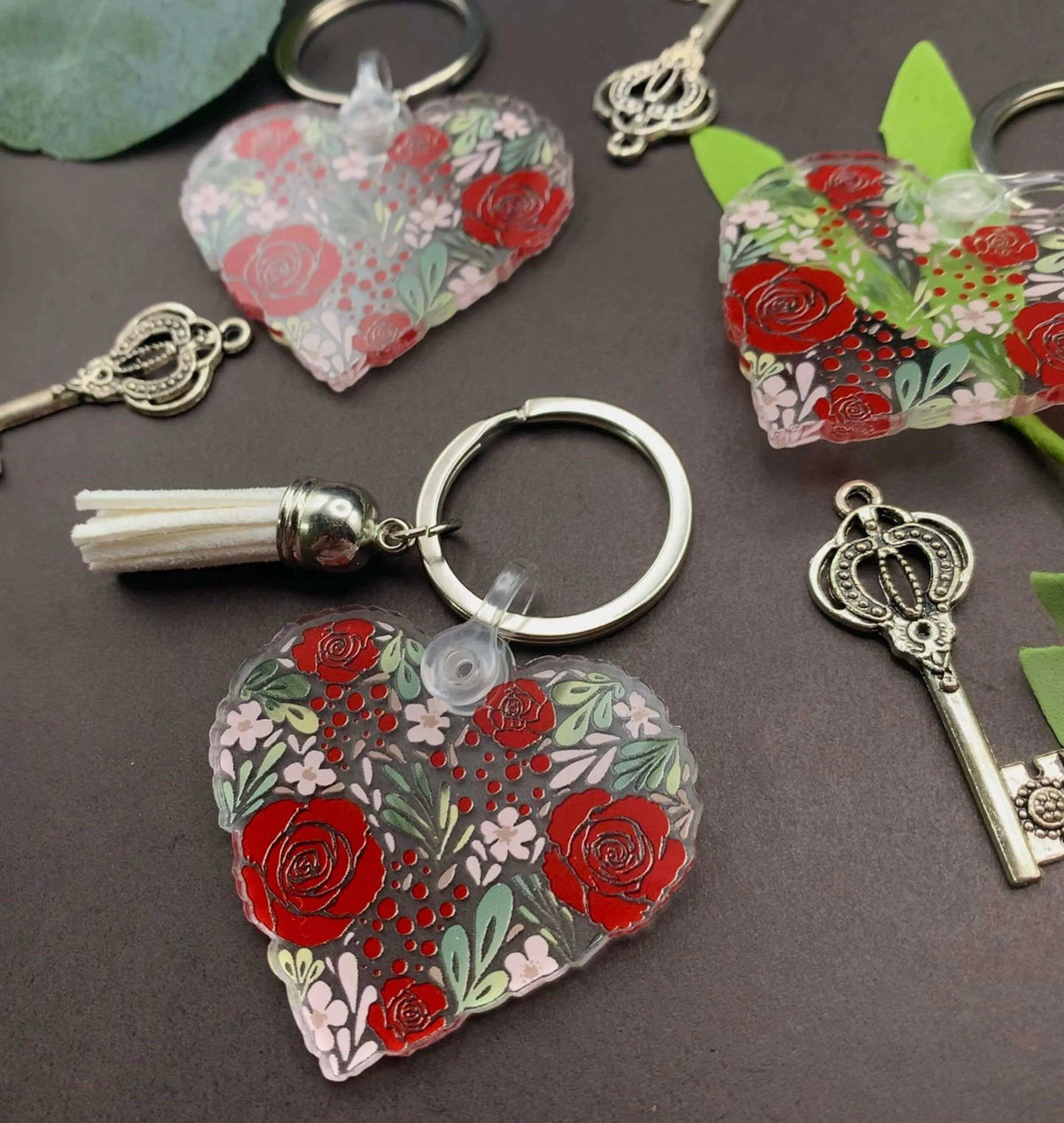 Vintage flower heart keychain by Winks Design Studio, LLC, featuring a charming floral heart design on a keychain.