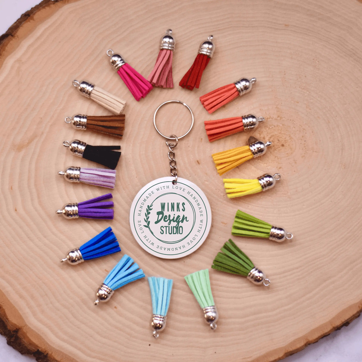 Winks Design Studio LLC WDS logo keychain with black and white design, featuring the brand&