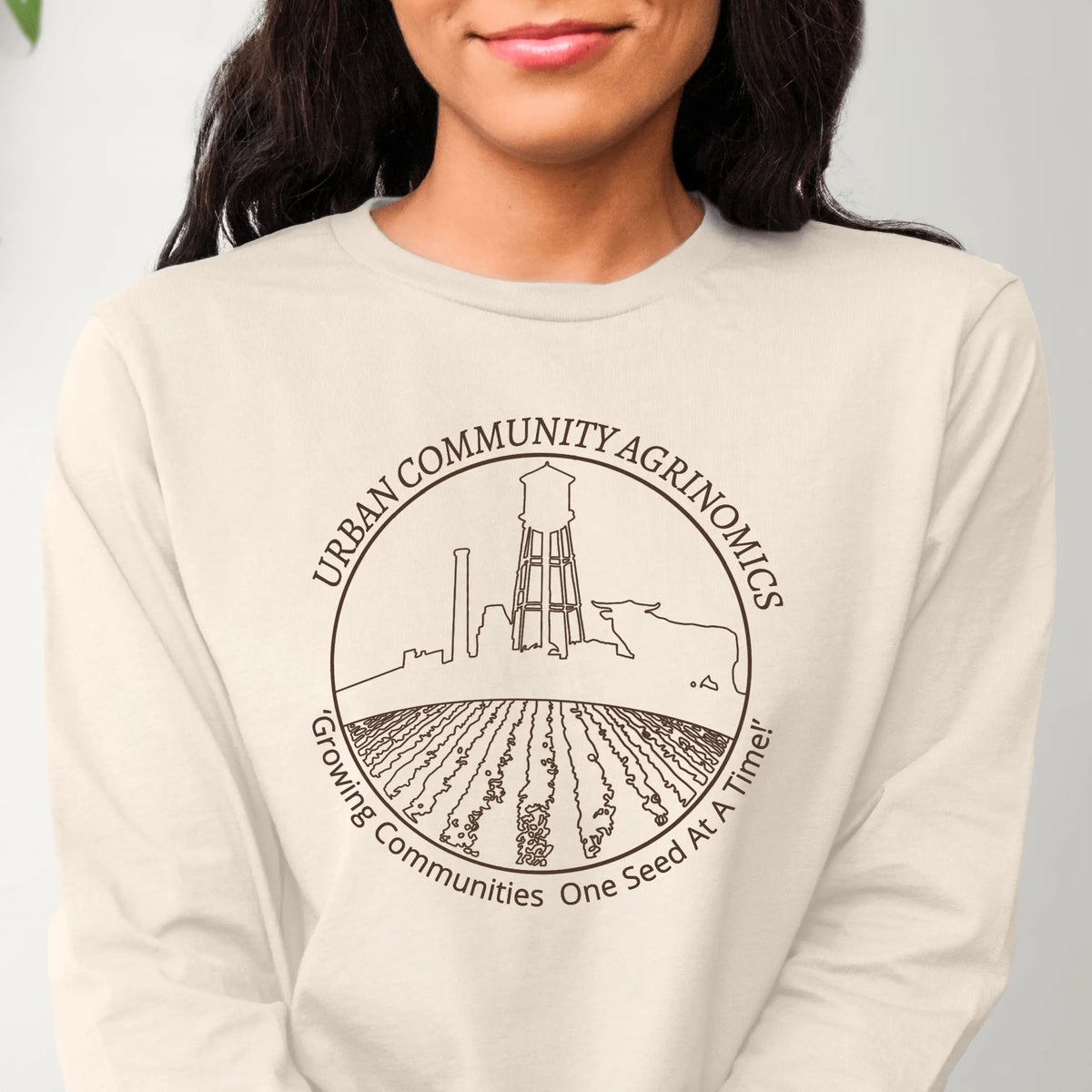 Winks Design Studio LLC UCAN long sleeve shirt in military green, small size, with a comfortable fit and casual style.