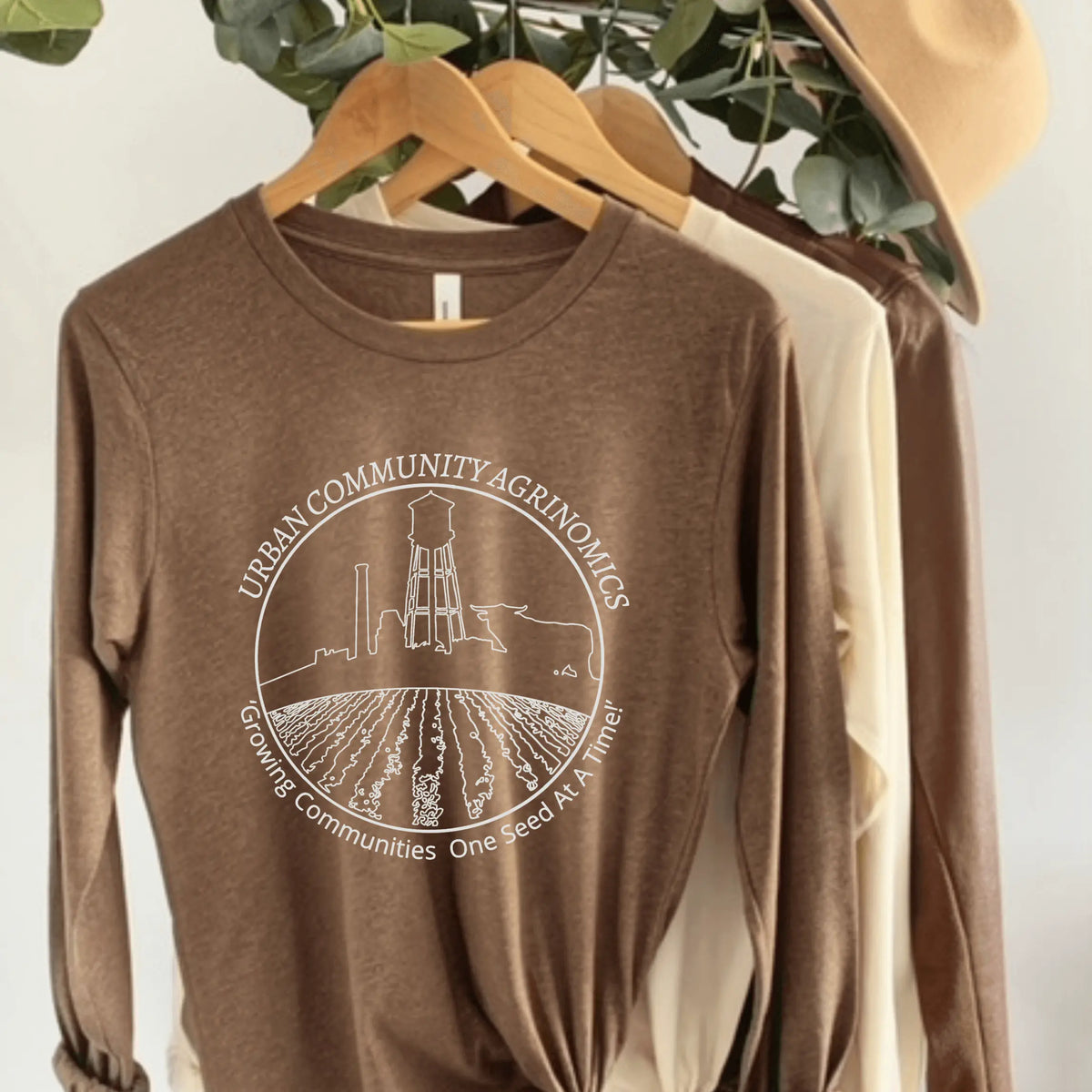 Winks Design Studio LLC UCAN Long Sleeve shirt in military green, small size, with long sleeves and casual fit.