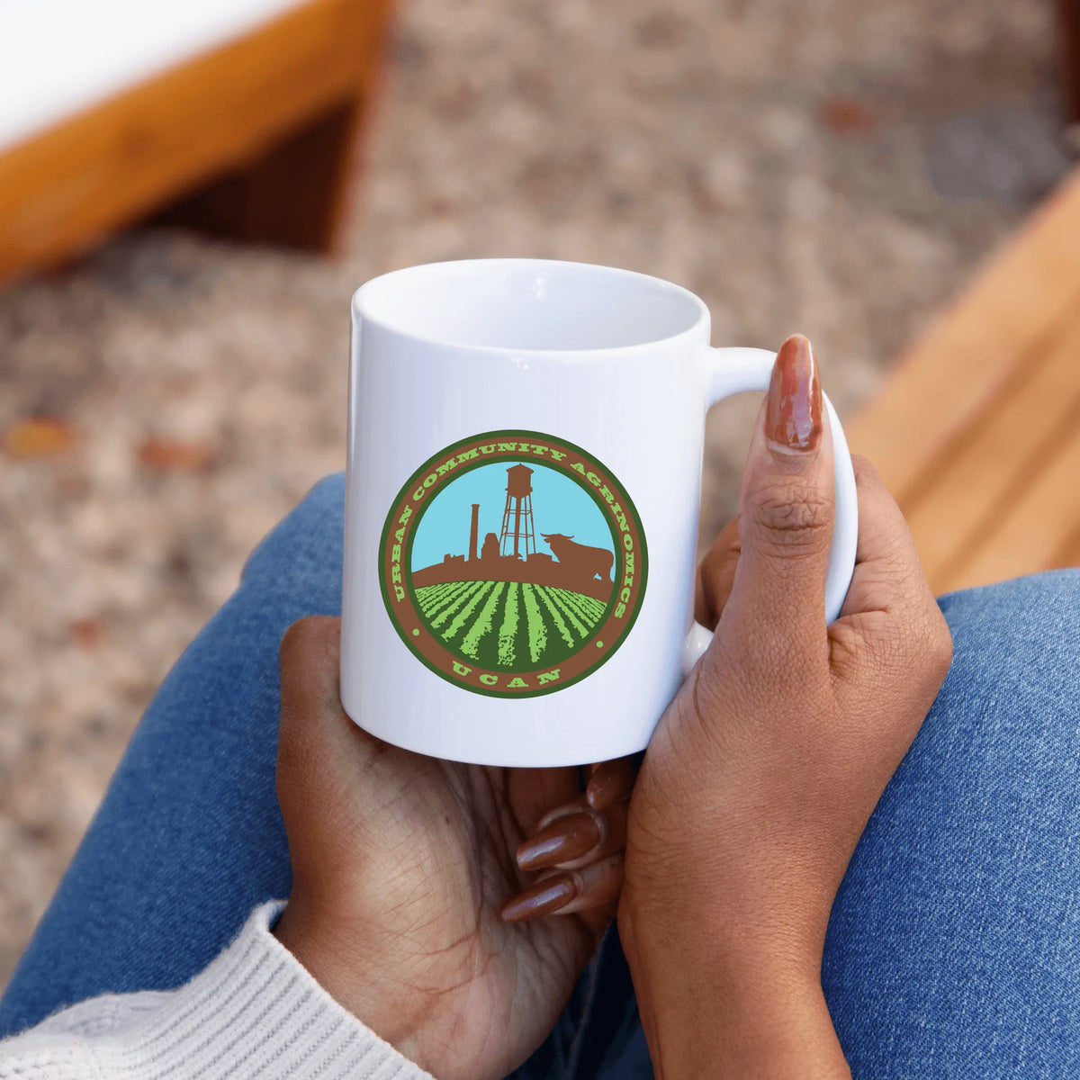 Winks Design Studio LLC UCAN 15oz ceramic mug with white exterior and colorful handle, designed for hot beverages.