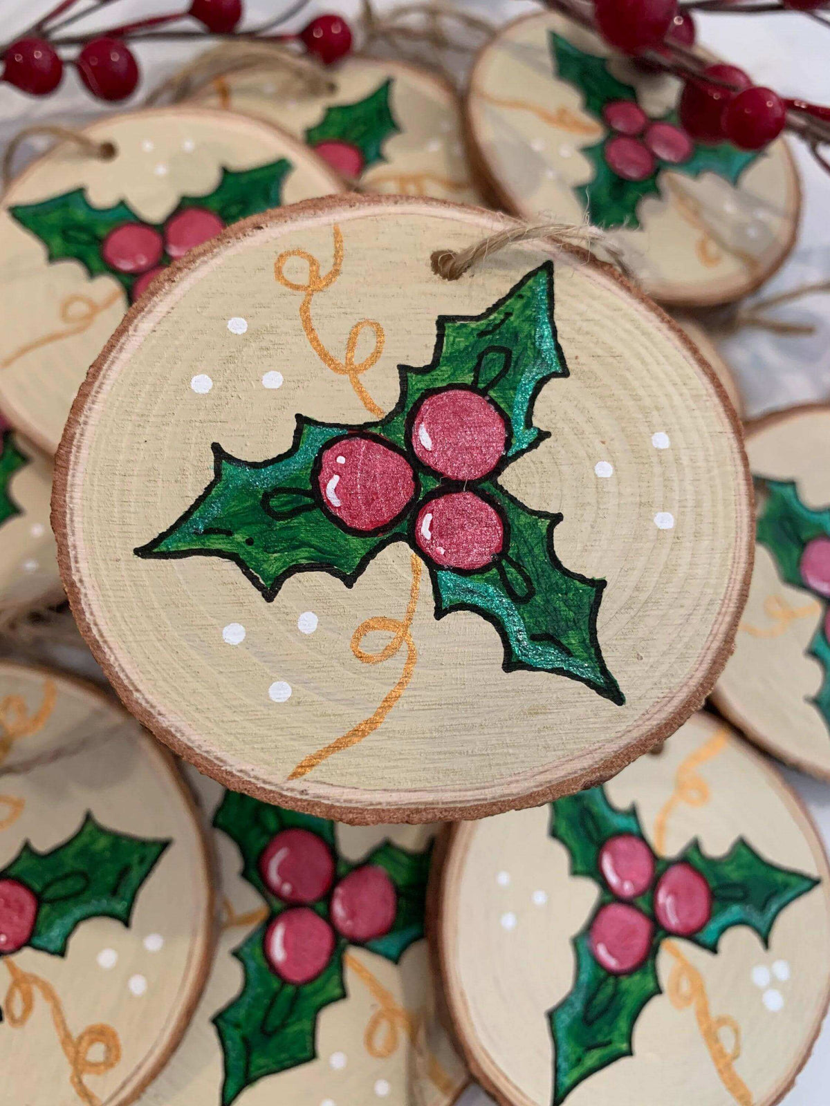 Christmas ornament featuring holly leaves and berries, decorative holiday ornament by Winks Design Studio, LLC.