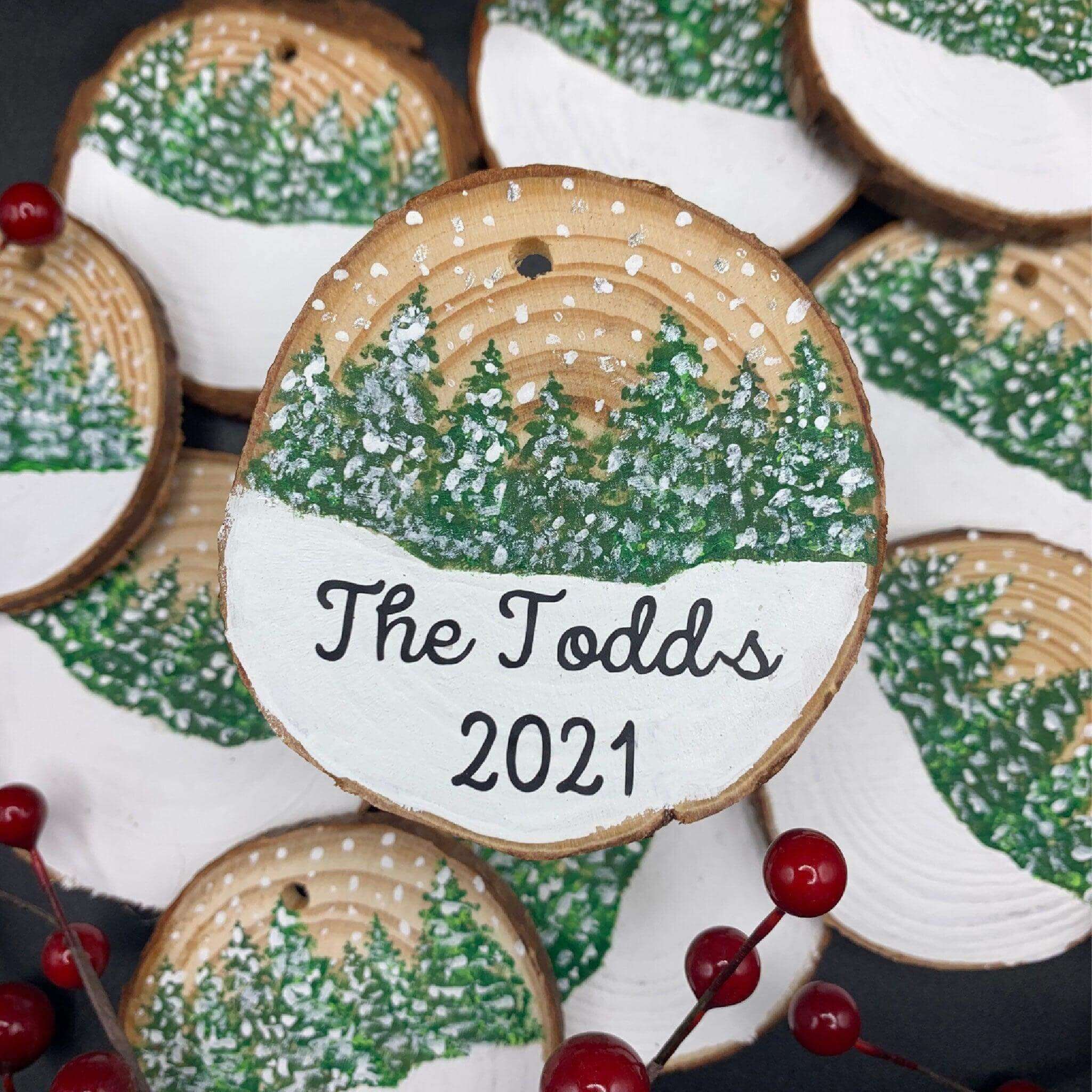 Personalized snow globe Christmas tree ornament by Winks Design Studio LLC, featuring a festive holiday scene inside a glass globe.