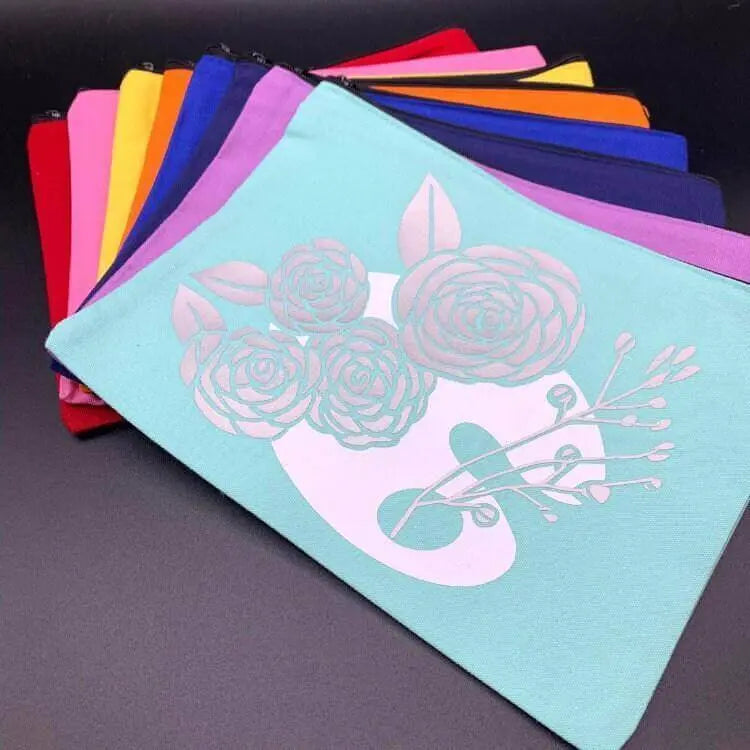 Red artist palette pencil bag by Winks Design Studio LLC, a craft case for pens and pencils with creative, colorful design.