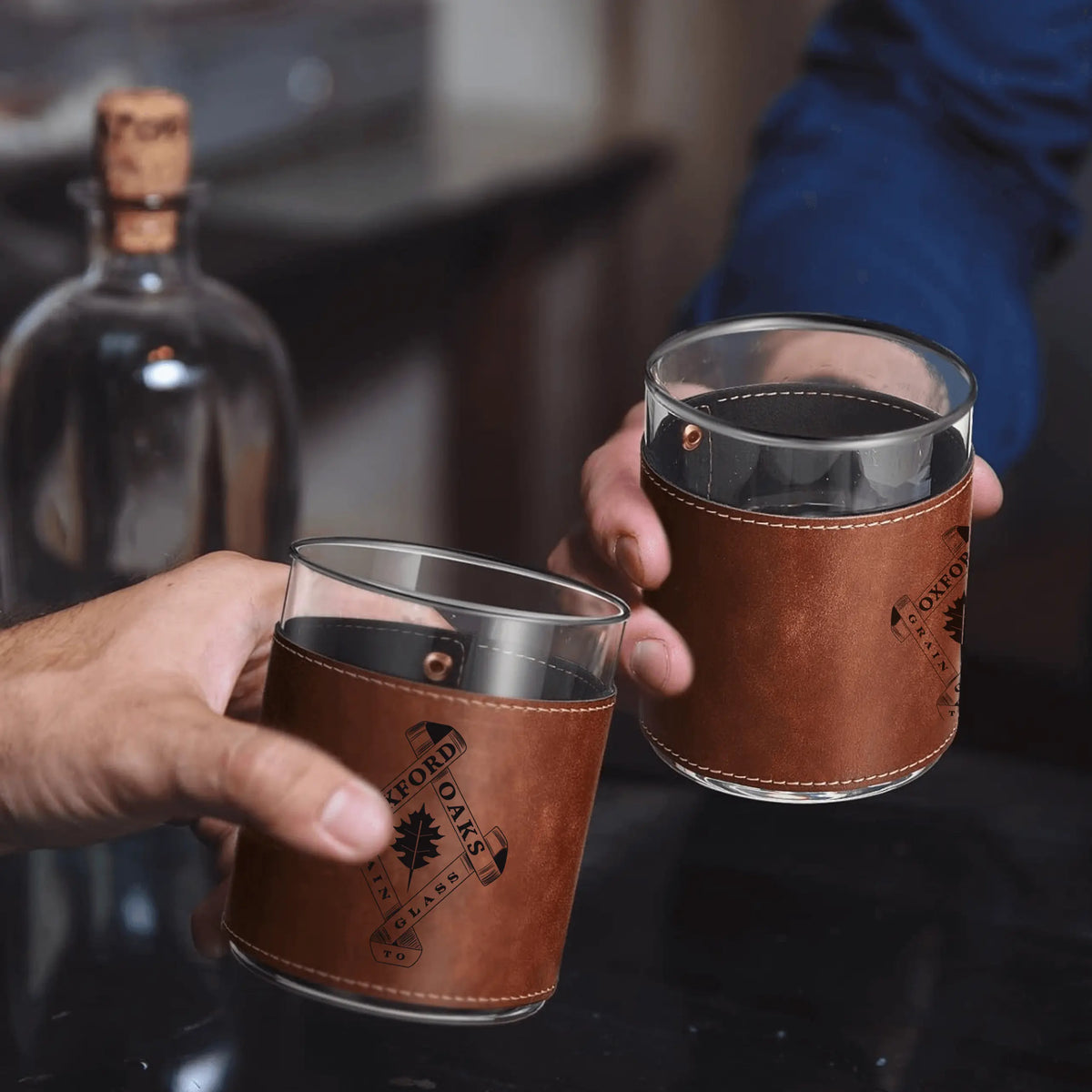 Oxford Oaks Distillery leather wrap rocks glass set by Winks Design Studio, LLC, featuring stylish leather accents on clear glass rocks glasses.