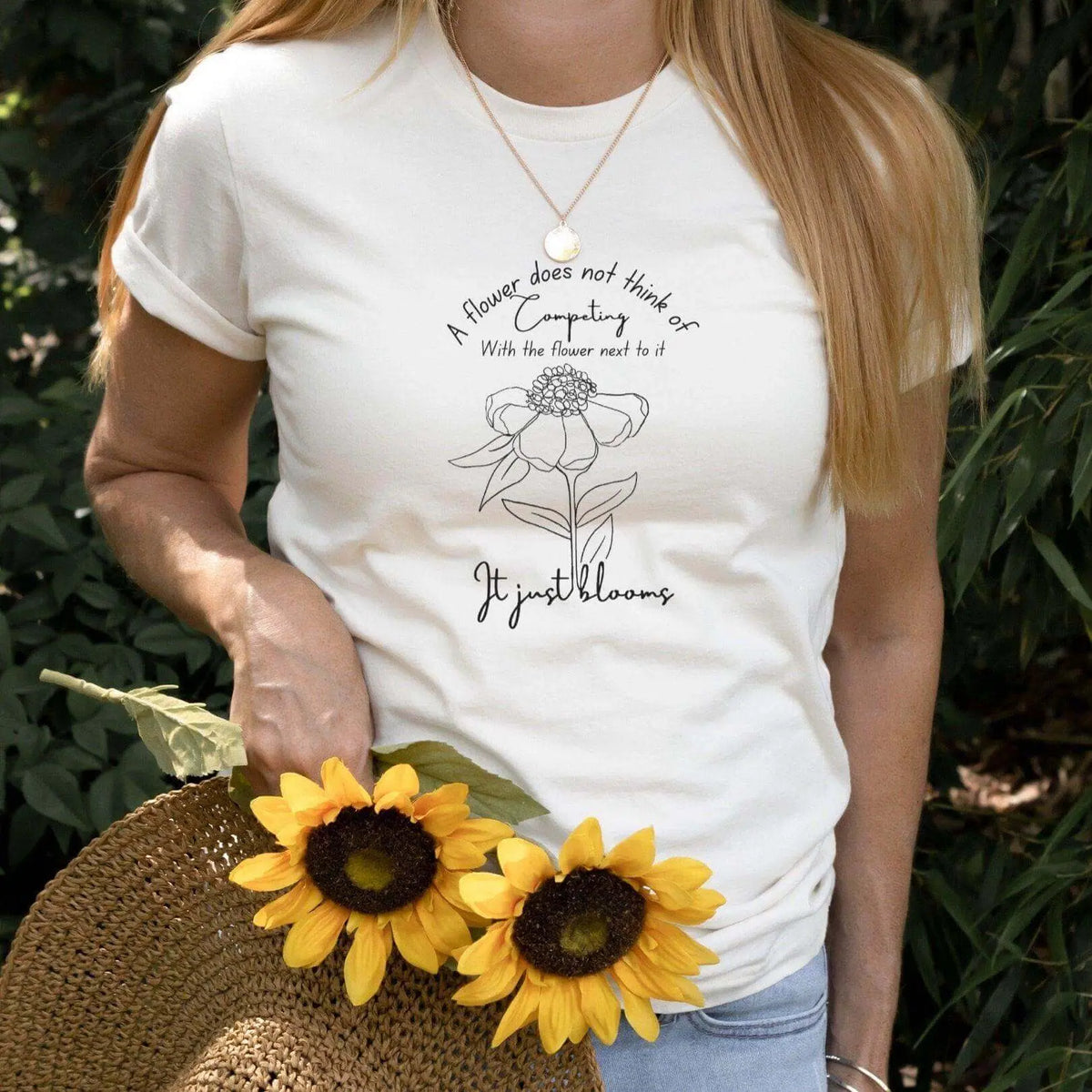 Mint green It Just Blooms Nature T-shirt by Winks Design Studio, LLC, featuring a floral-inspired design on the front.