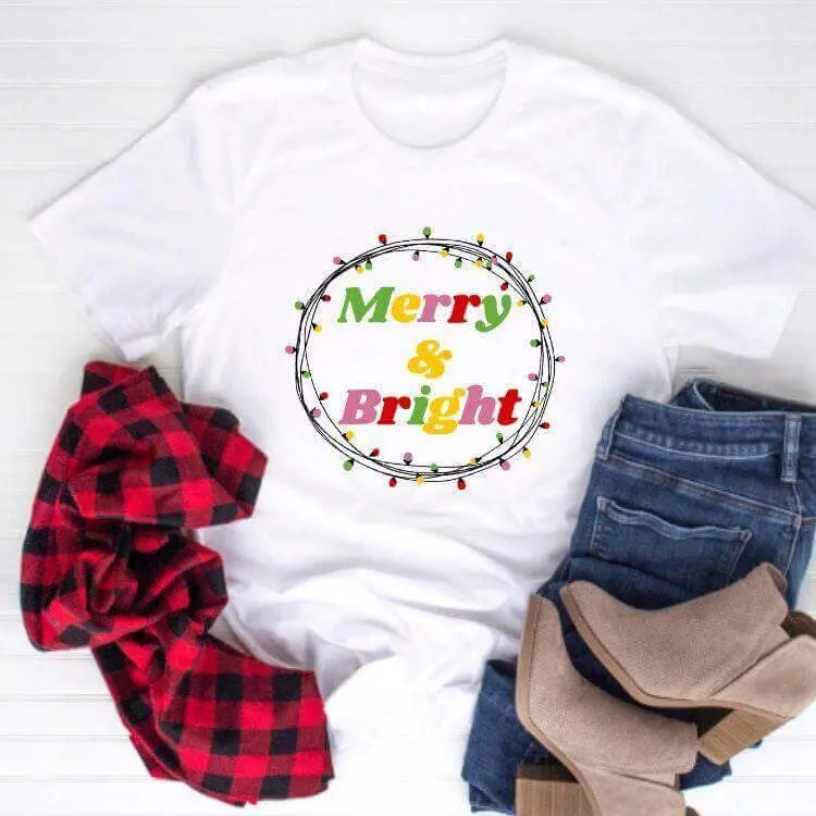 Small Merry and Bright shirt from Winks Design Studio, LLC, with short sleeves and festive holiday design.