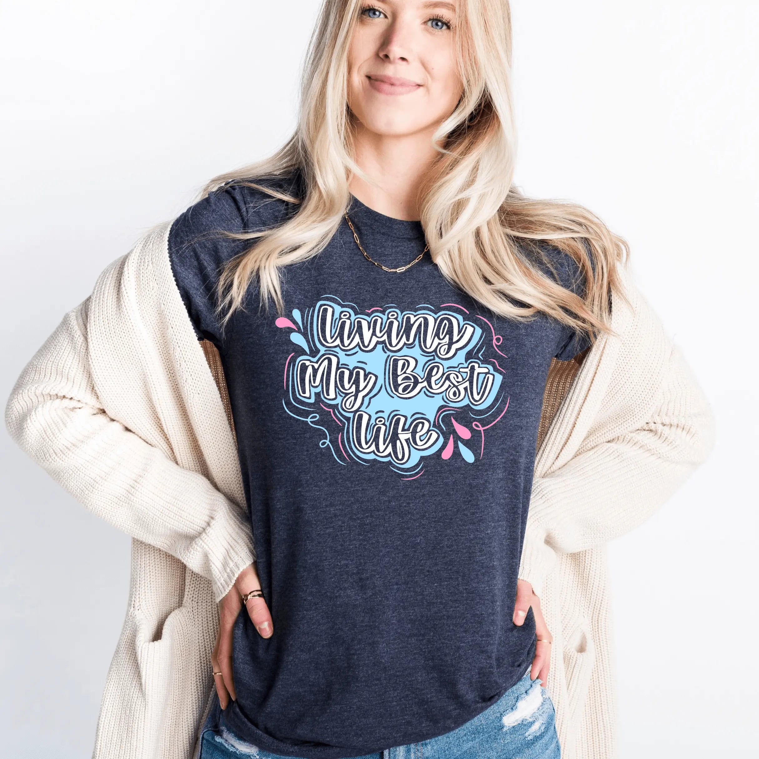 Living My Best Life graphic T-shirt from Winks Design Studio, LLC, featuring bold lettering and casual fit for everyday wear.