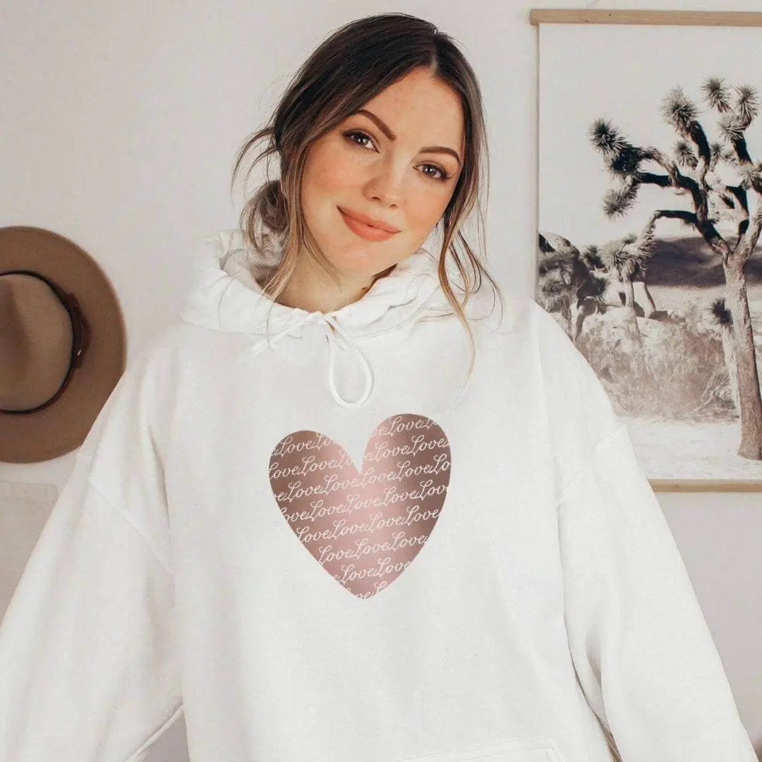 Copper Heart Sweatshirt by Winks Design Studio, LLC featuring a small copper heart design on a cozy sweatshirt.