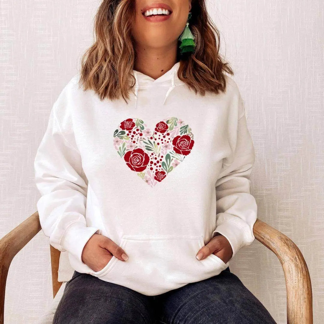 Small flower heart sweatshirt by Winks Design Studio, LLC featuring a soft fabric and floral heart design.