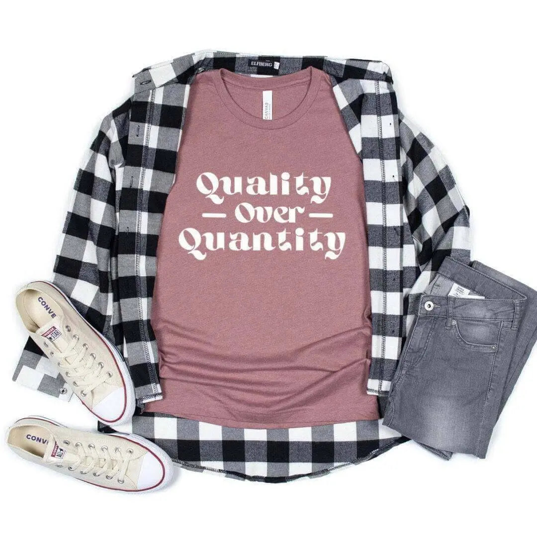 Black Winks Design Studio LLC Quality Over Quantity T-shirt, small size, casual fit, front graphic design, soft cotton fabric.