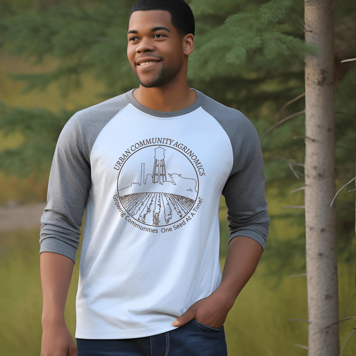 Gray and white UCAN Raglan baseball T-shirt by Winks Design Studio, LLC, shown on a small-sized model.