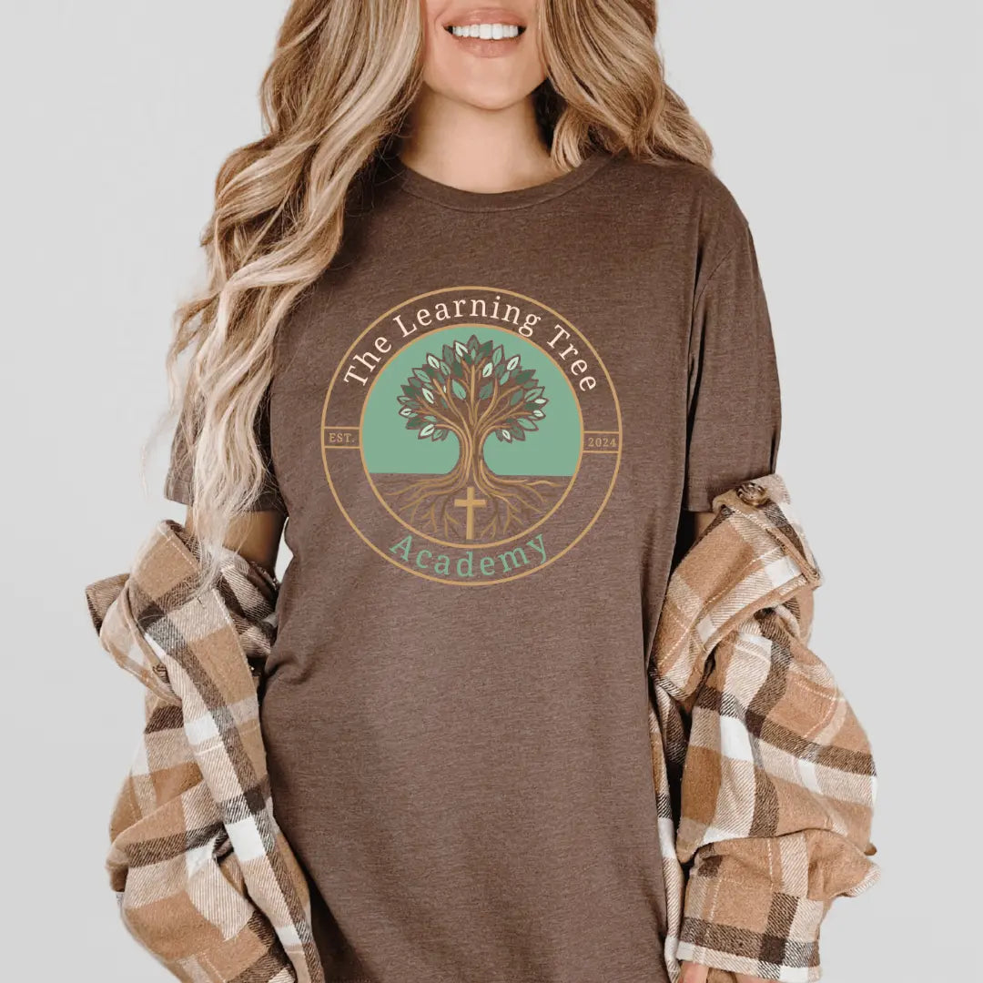 Brown The Learning Tree Academy T-shirt by Winks Design Studio, LLC, featuring a comfortable fit and educational-themed design.