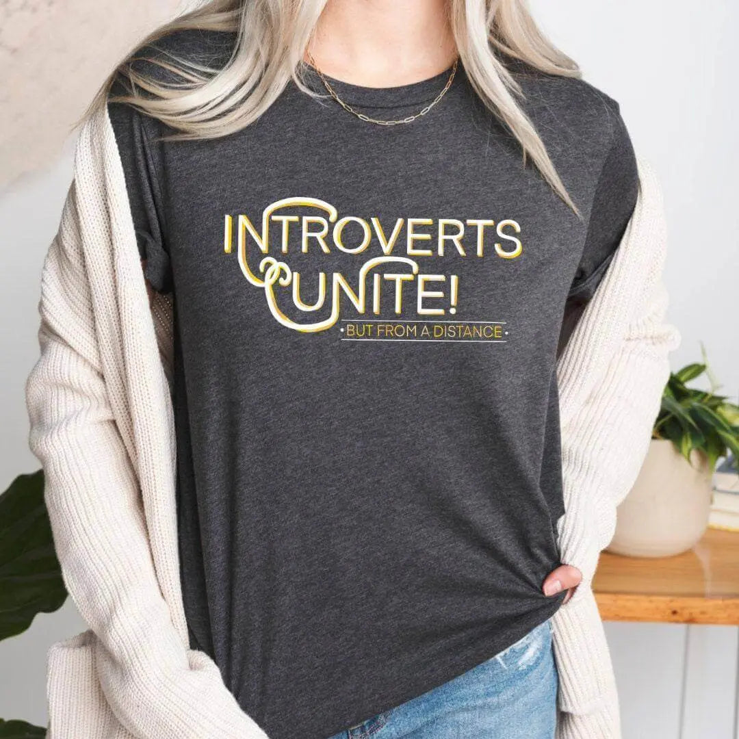 Winks Design Studio LLC introverts unite T-shirt with bold text, featuring a comfortable casual fit and soft fabric for everyday wear.