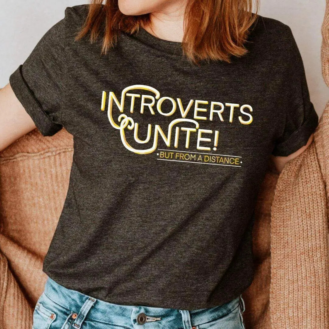 Winks Design Studio LLC Introverts Unite T-shirt, black cotton T-shirt with white text, casual and comfortable for introverts.