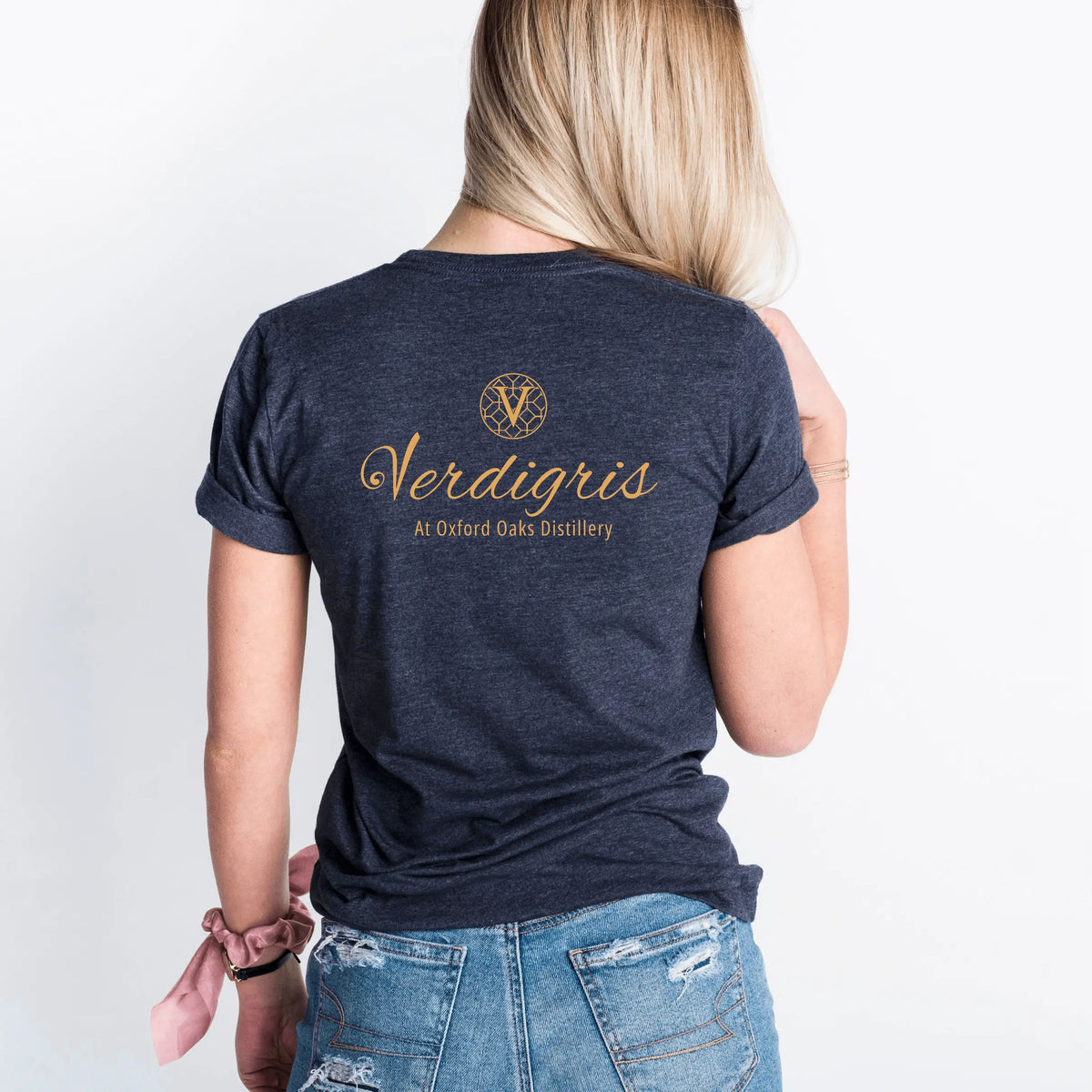 Navy blue Verdigris T-shirt by Winks Design Studio, LLC, featuring a small chest logo on the front.