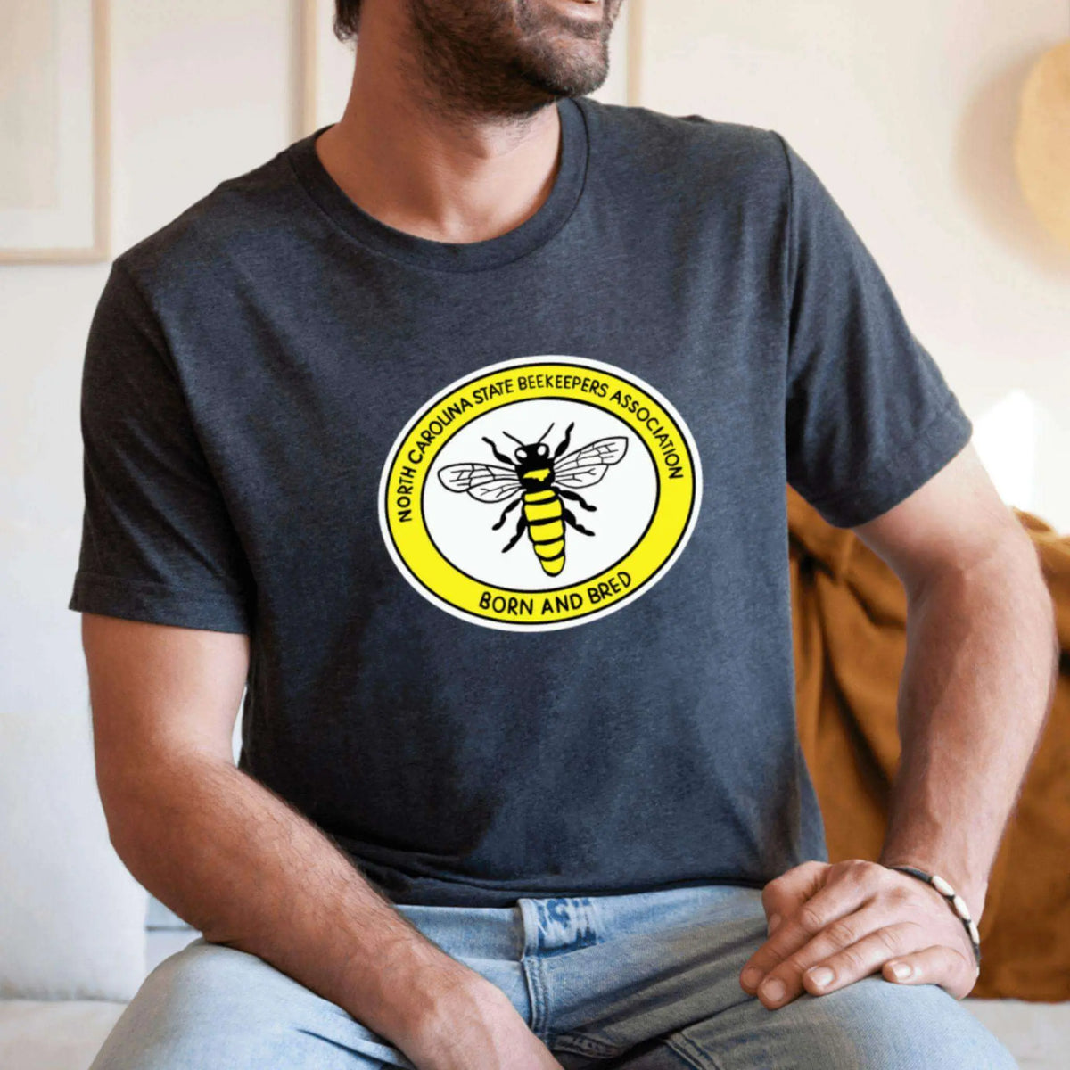 Winks Design Studio LLC NCSBA Born and Bred Program short sleeve T-shirt with printed design, casual fit, white fabric.