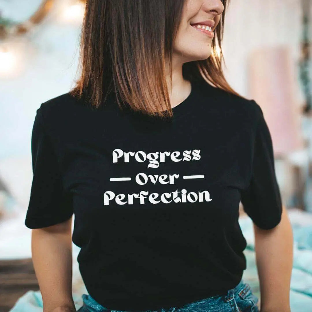 Progress Over Perfection T-shirt by Winks Design Studio, LLC, featuring a casual fit with bold text on soft fabric.