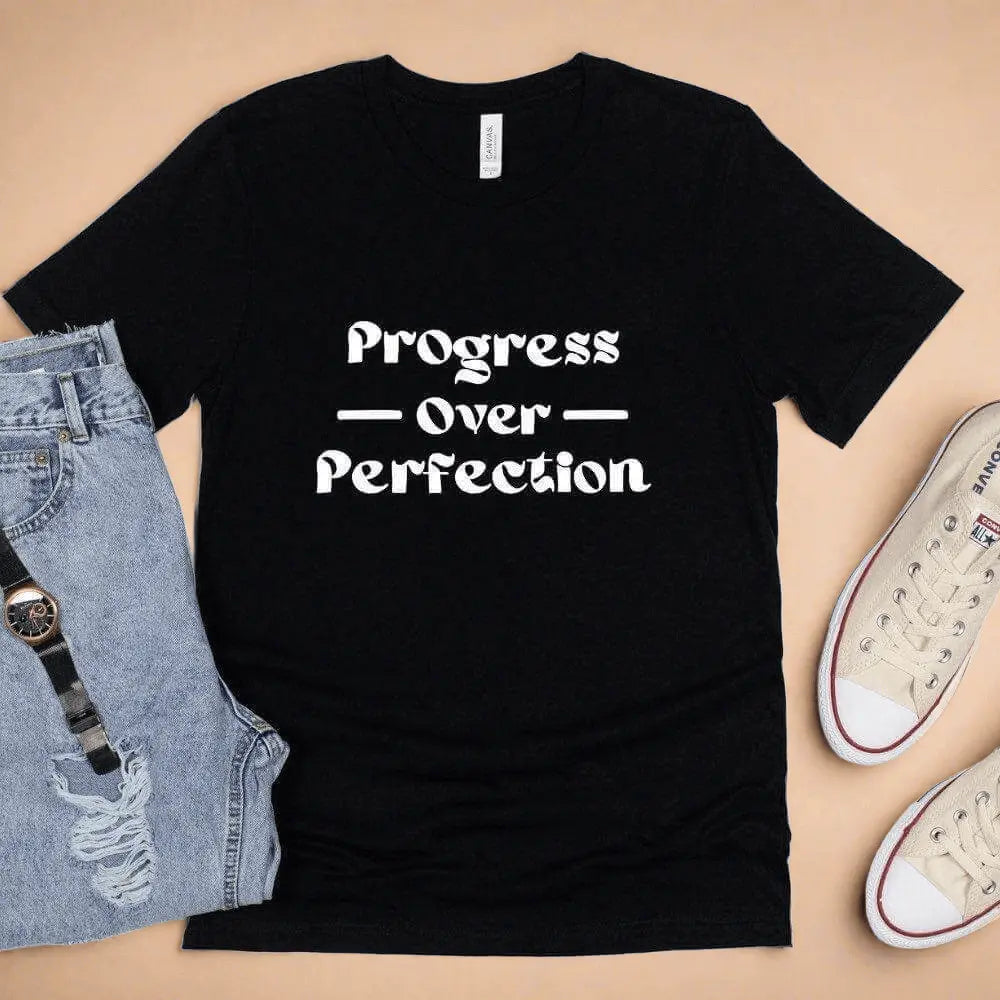 Progress Over Perfection T-shirt by Winks Design Studio, LLC, featuring a casual fit and motivational slogan on soft fabric.