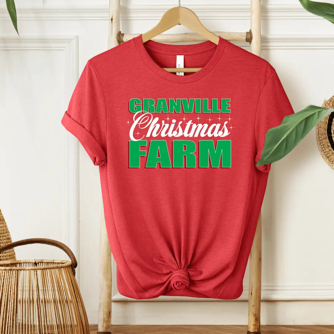 Red Granville Christmas Farm T-shirt by Winks Design Studio showing festive farm scene on the front.