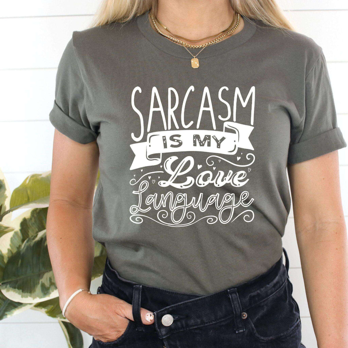 Black T-shirt by Winks Design Studio LLC featuring the slogan "Sarcasm is My Love Language" in white text.