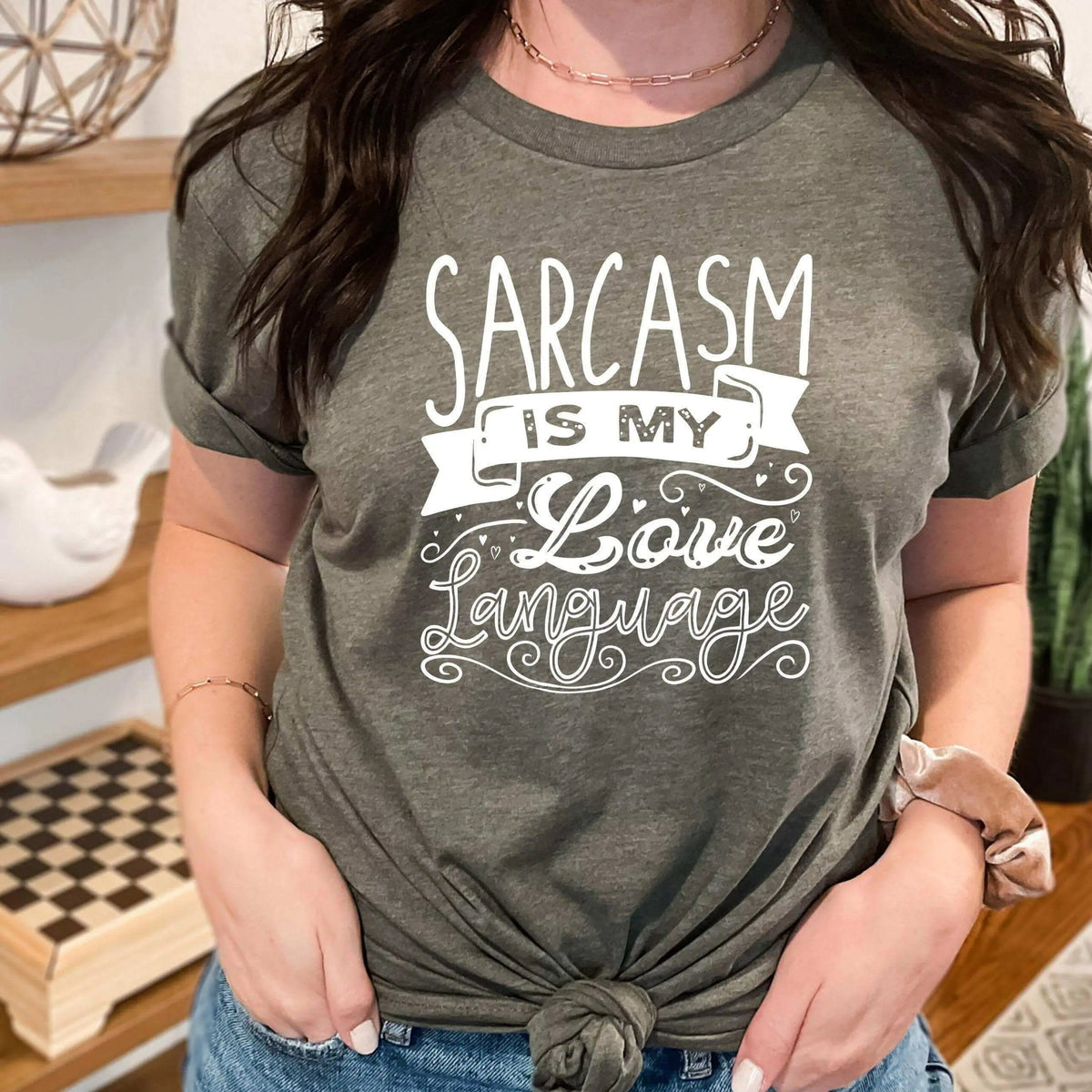 Black T-shirt from Winks Design Studio with the phrase "Sarcasm is My Love Language" printed on the front.