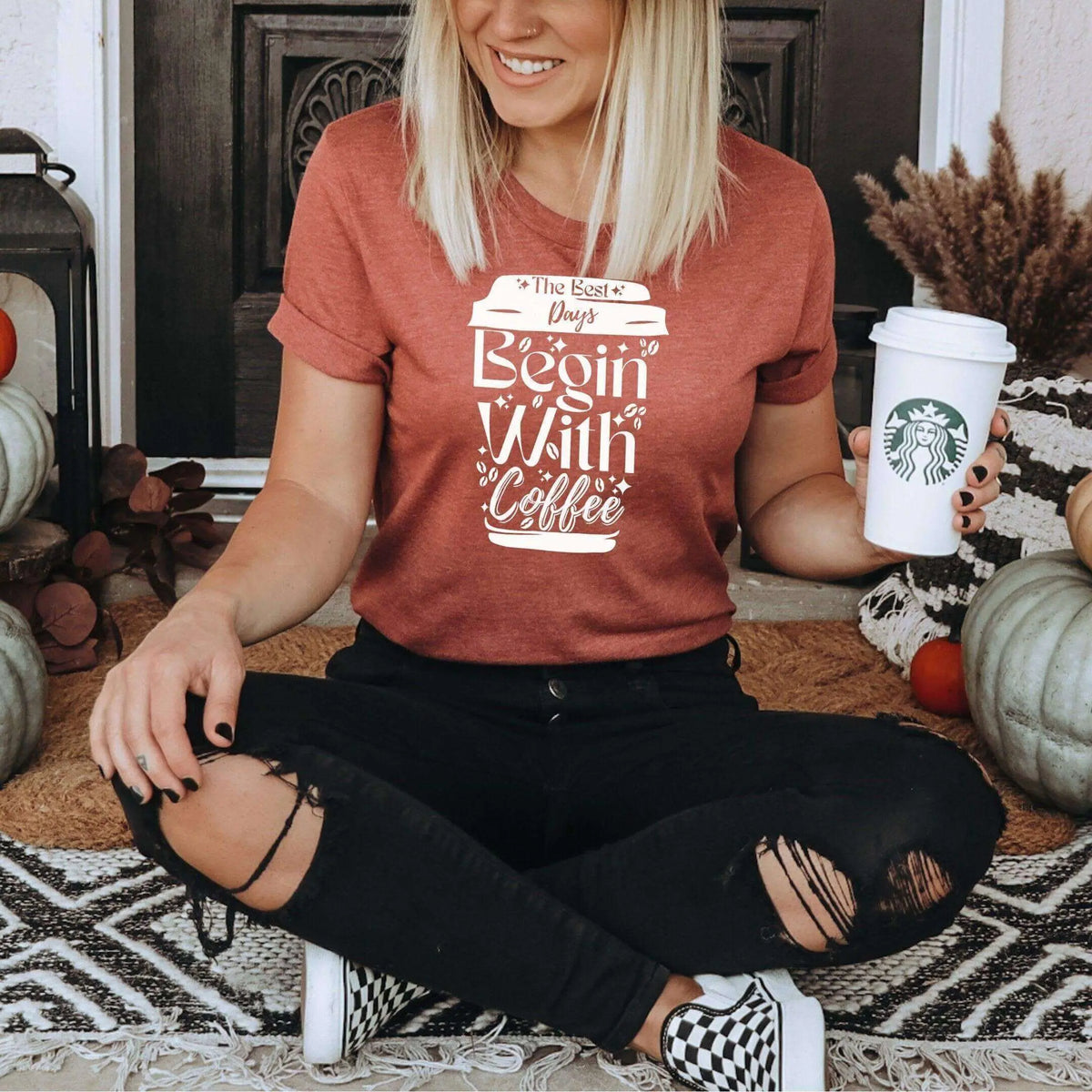 Winks Design Studio LLC graphic T-shirt featuring "The Best Days Begin With Coffee" text and coffee cup illustration.