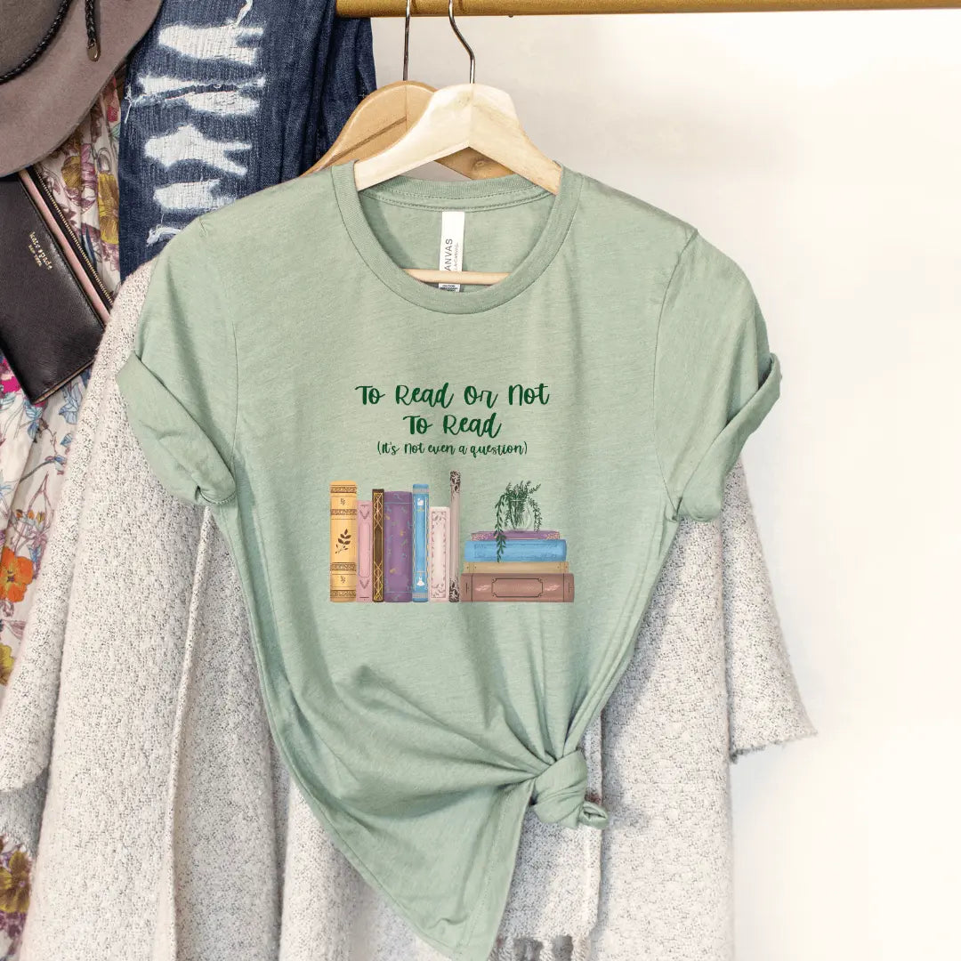 Winks Design Studio LLC To Read Or Not To Read T-shirt featuring a printed quote, casual fit, and soft fabric.