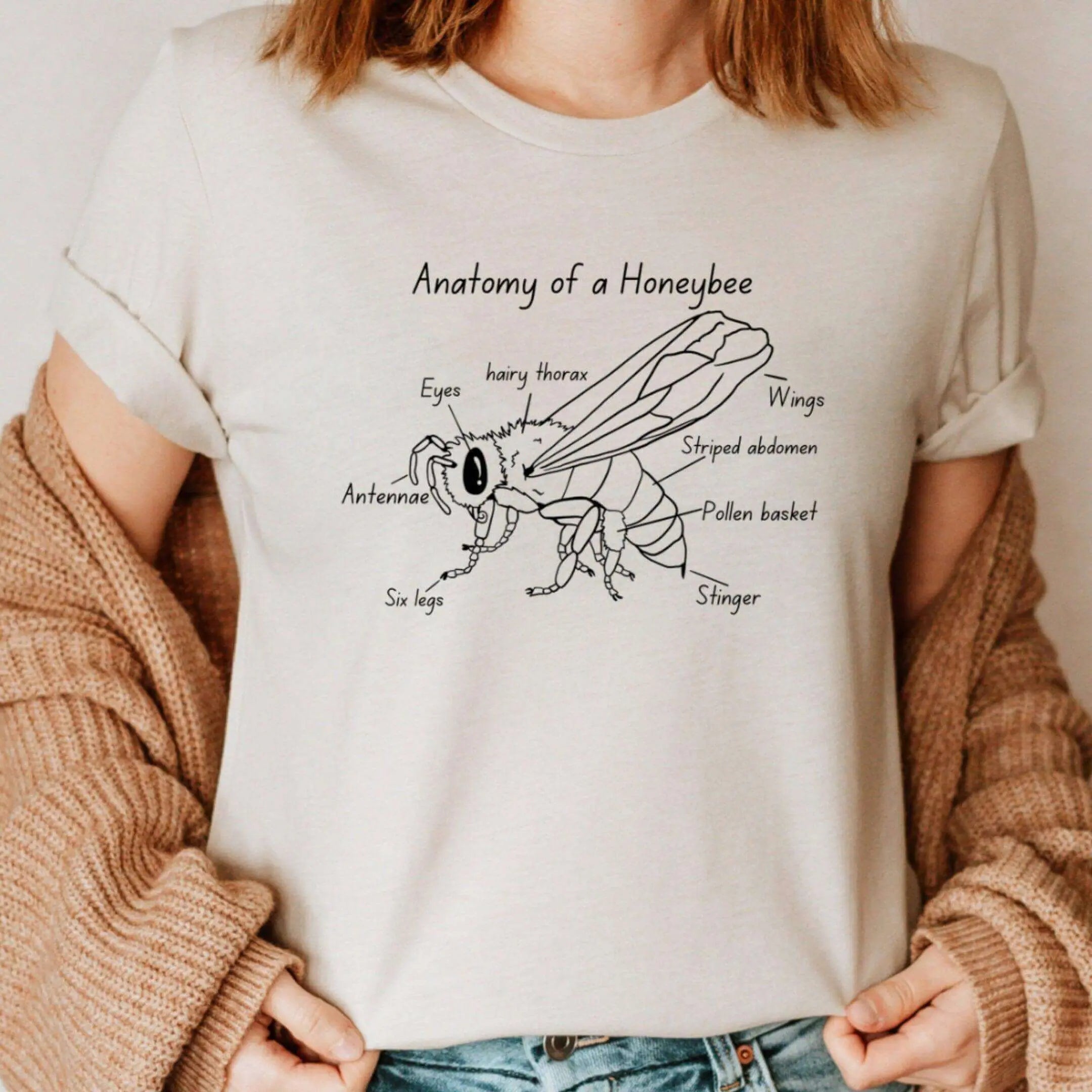 Yellow T-shirt by Winks Design Studio featuring an anatomical illustration of a honeybee on the front.