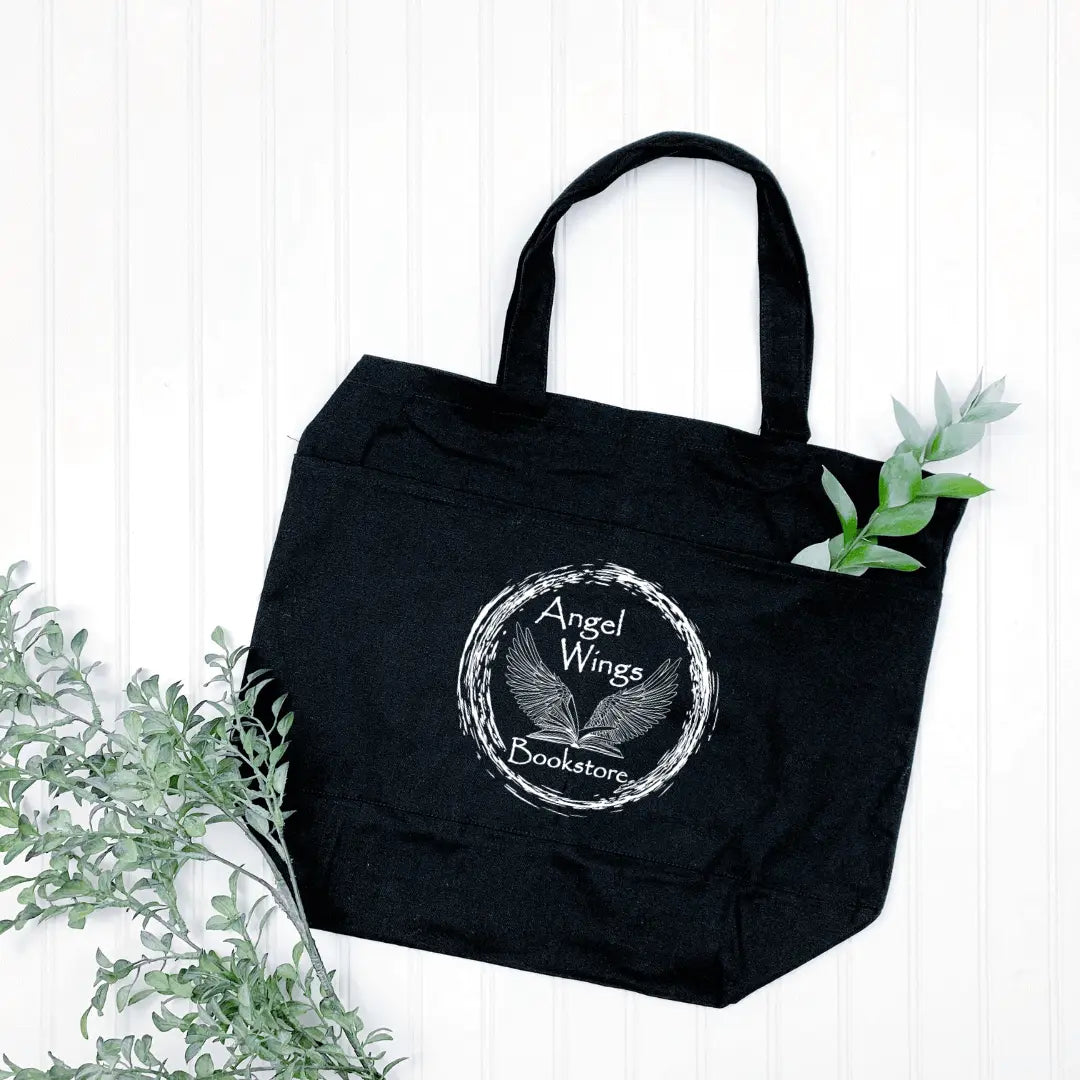 Winks Design Studio LLC Angel Wings Bookstore Tote bag with circular natural design and multiple pockets, eco-friendly fabric.