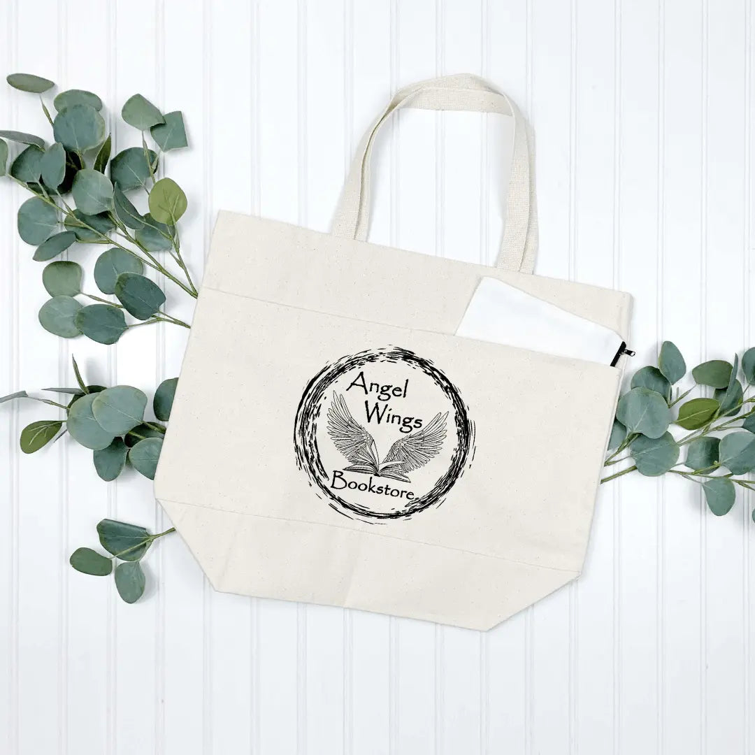 Natural canvas tote bag with angel wings design and multiple pockets, by Winks Design Studio, LLC.