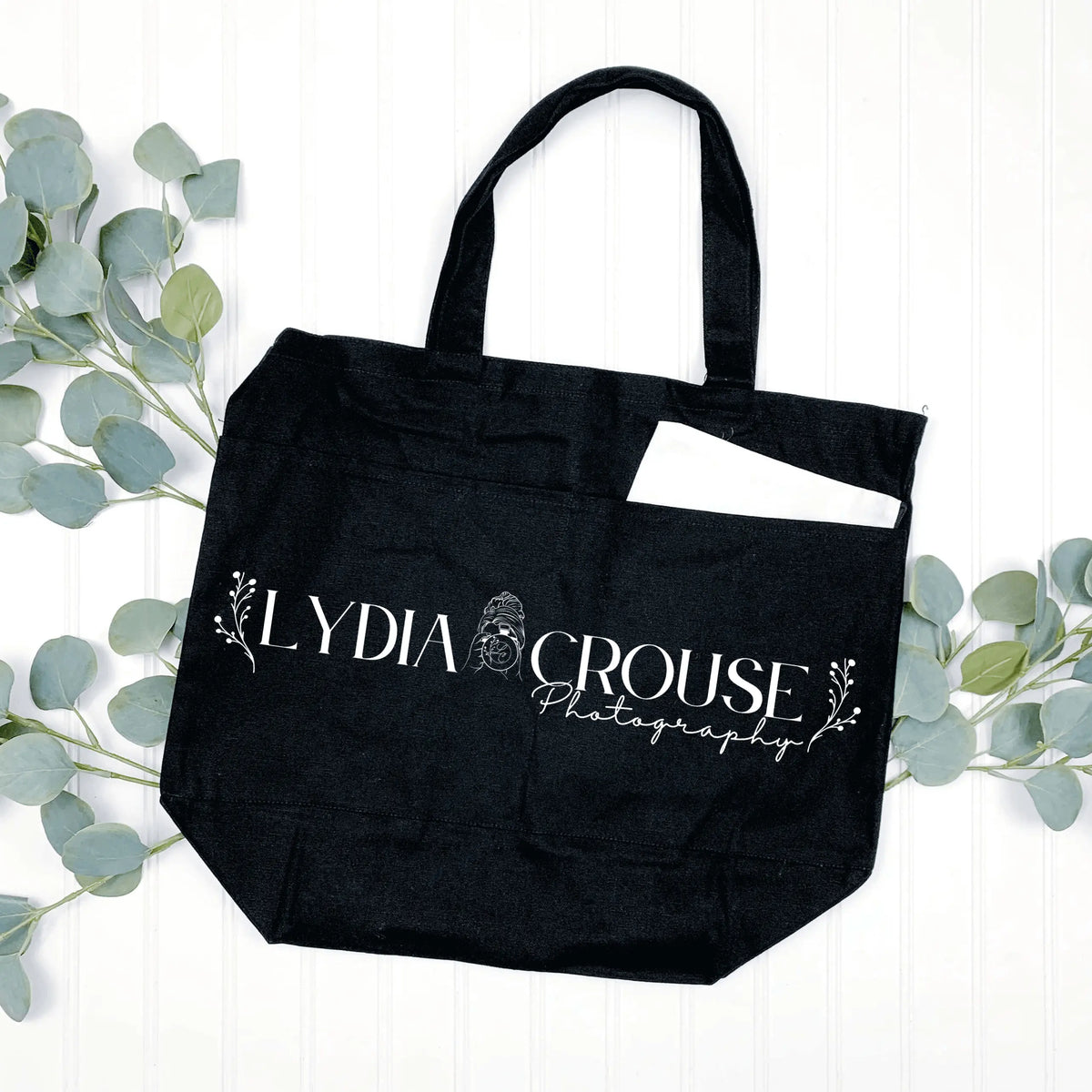 Winks Design Studio LLC Lydia Crouse tote bag with multiple pockets in natural color, showcasing its spacious design and sturdy handles.