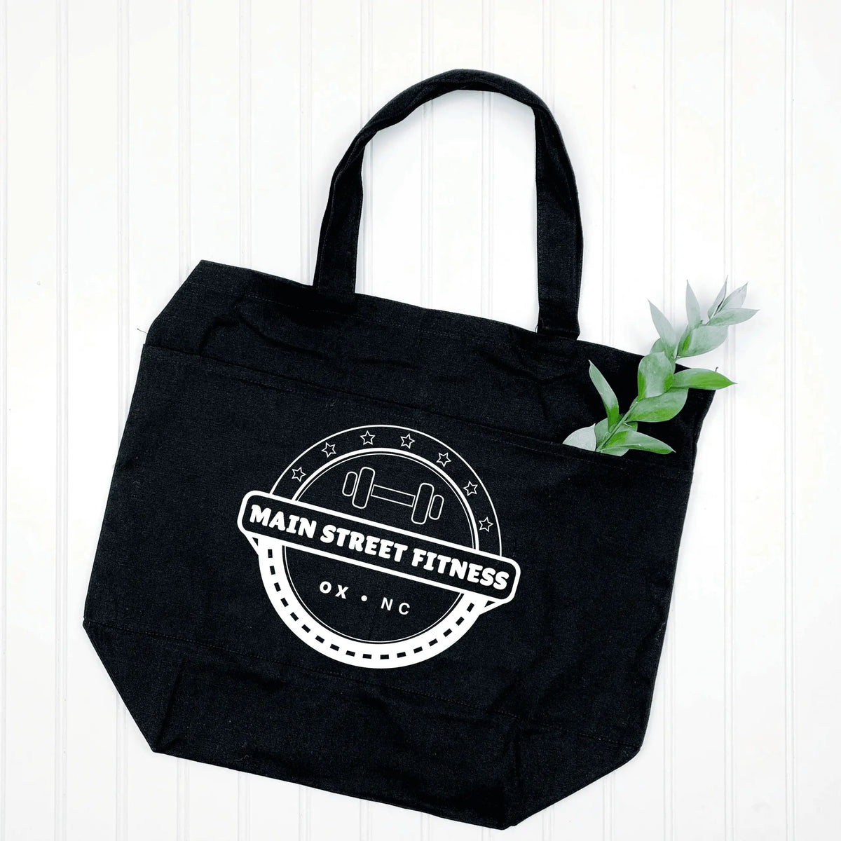 Winks Design Studio LLC Main Street Fitness Tote bag in natural color with multiple pockets, showcasing its spacious and functional design.