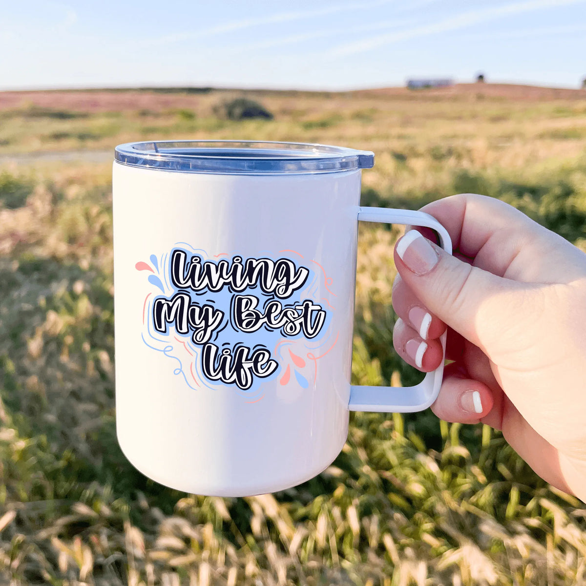 Living My Best Life 13oz insulated stainless steel tumbler by Winks Design Studio, LLC, with a colorful printed design.