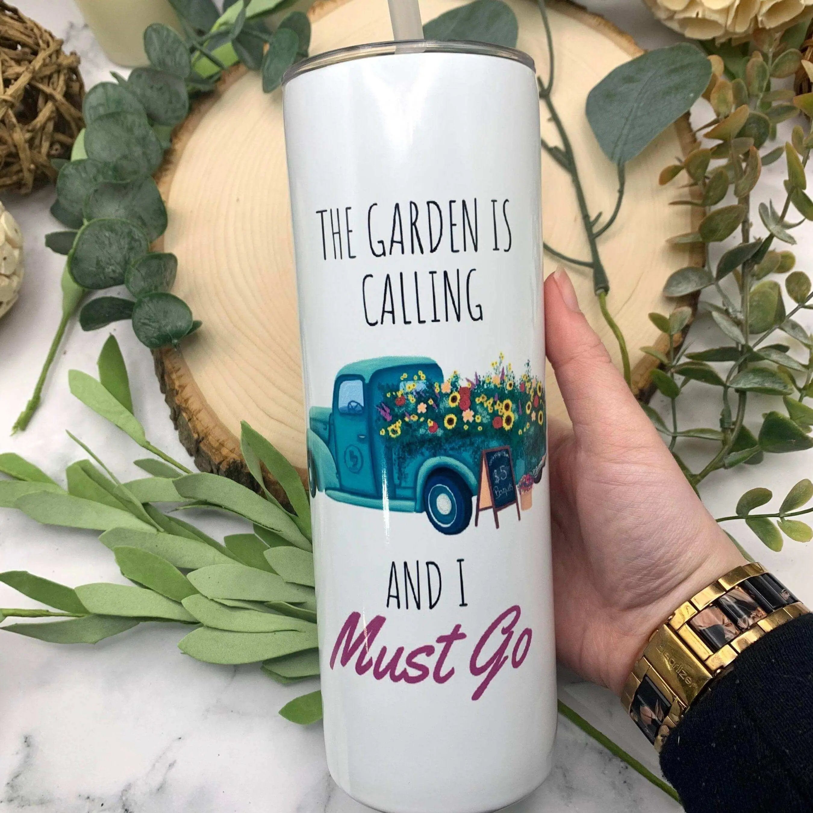 Winks Design Studio LLC insulated tumbler with "The Garden is Calling" printed design, ideal for hot or cold beverages.