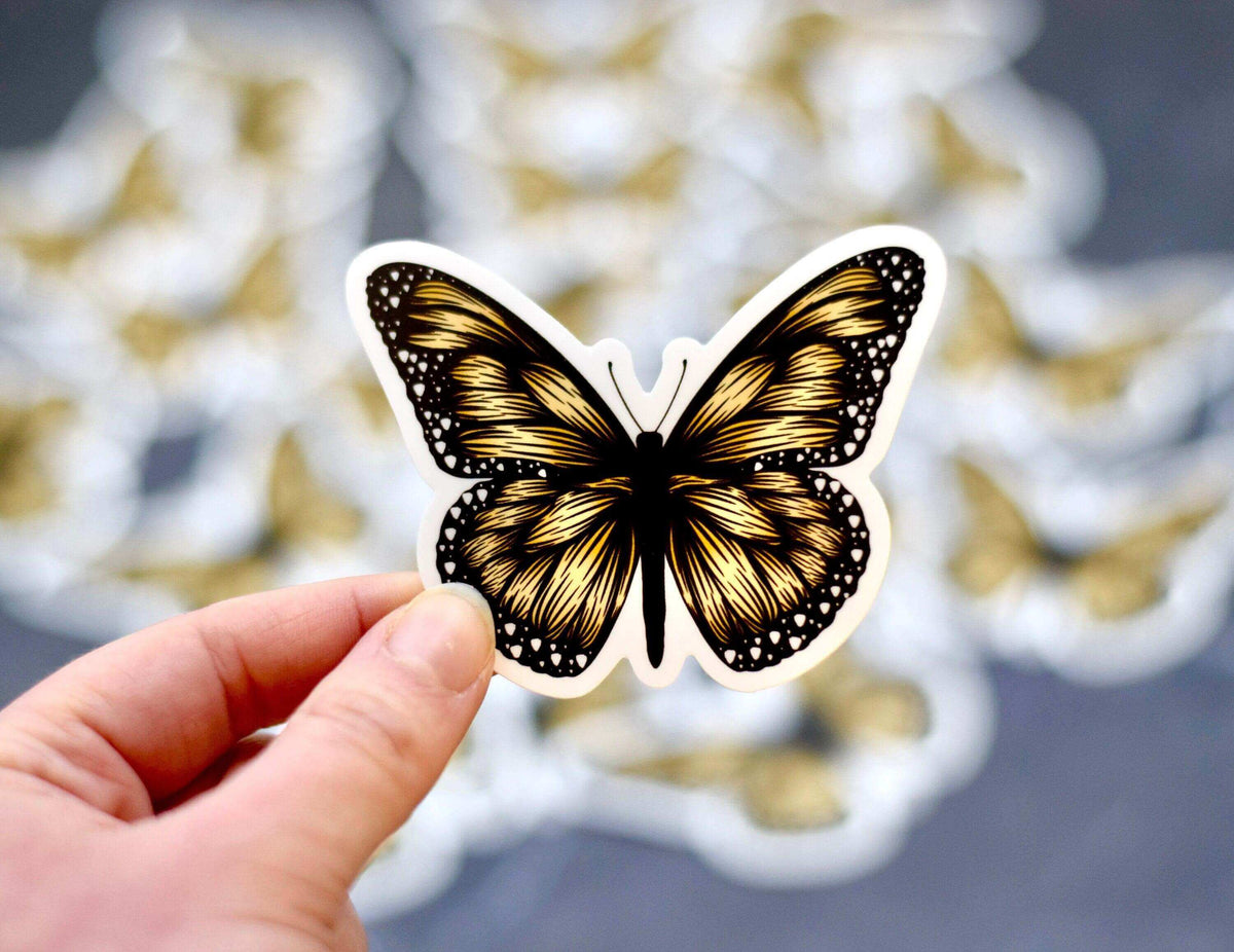 Boho Monarch Butterfly vinyl sticker by Winks Design Studio, LLC featuring colorful butterfly design on transparent background.