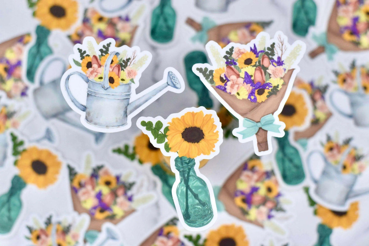 Vinyl sticker featuring a colorful flower bouquet design from Winks Design Studio, LLC, perfect for decorating notebooks or accessories.