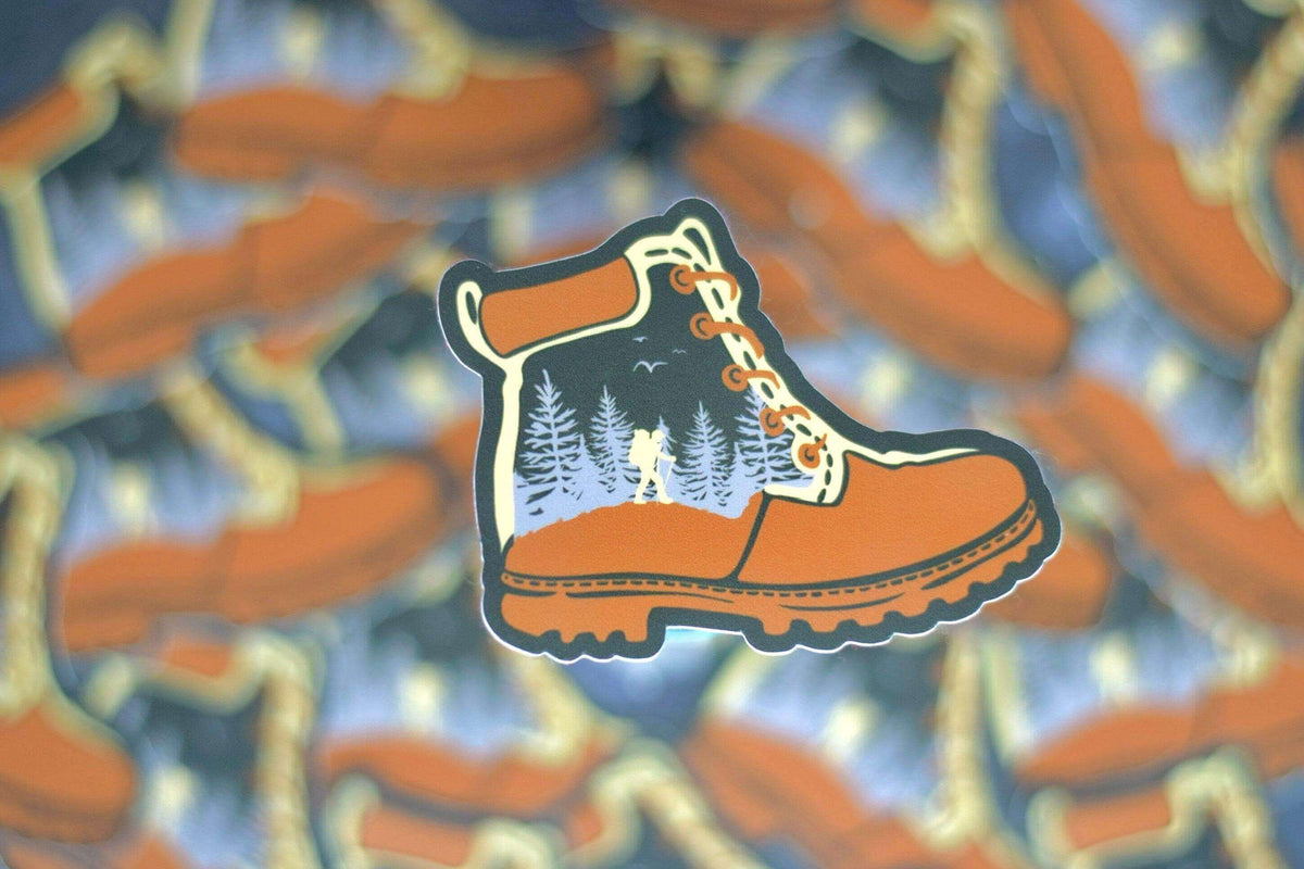 Vinyl sticker featuring a hiking boot design by Winks Design Studio, LLC, perfect for outdoor gear or personalizing accessories.