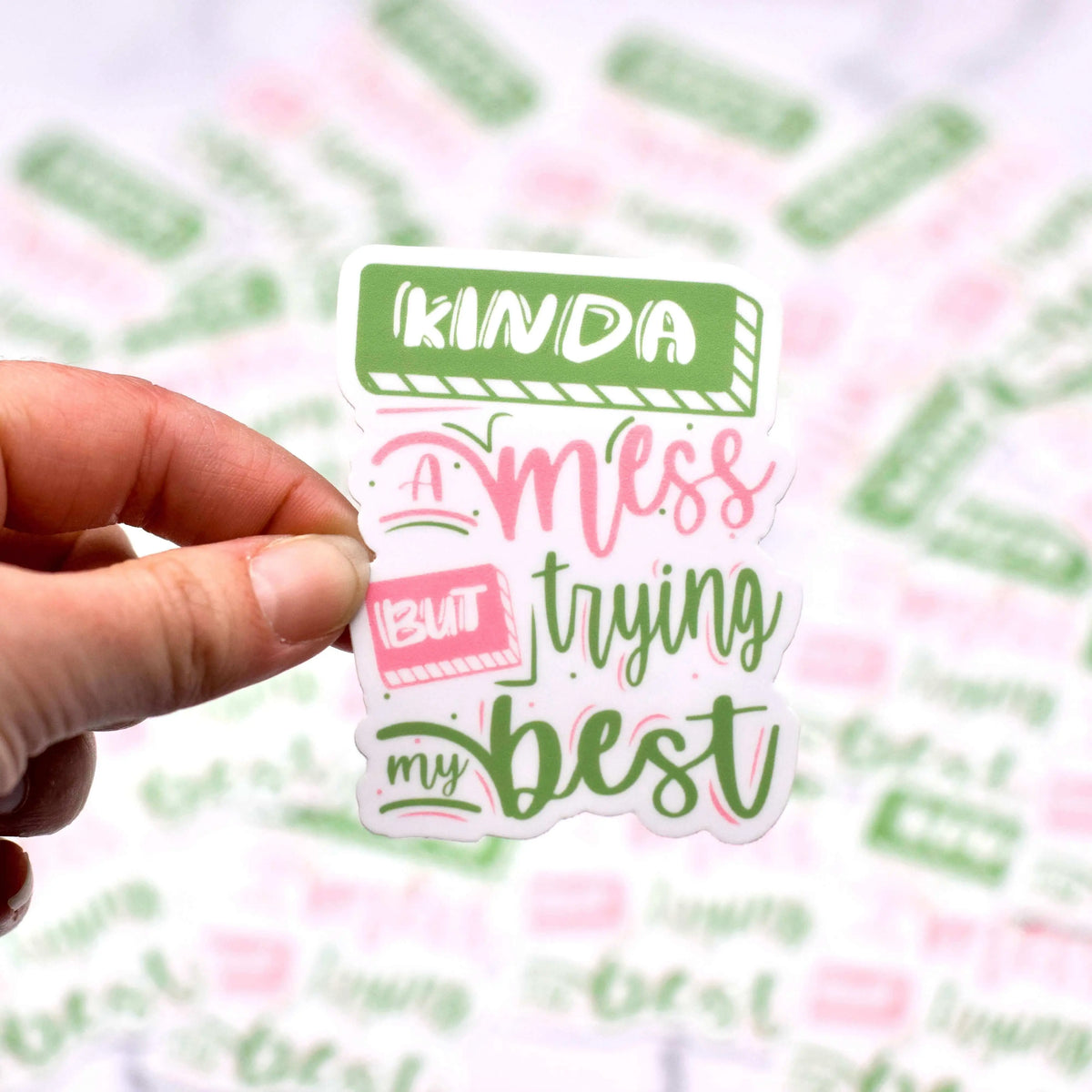 Kinda A Mess But Trying My Best vinyl sticker by Winks Design Studio, LLC, featuring handwritten-style text on a clear background.