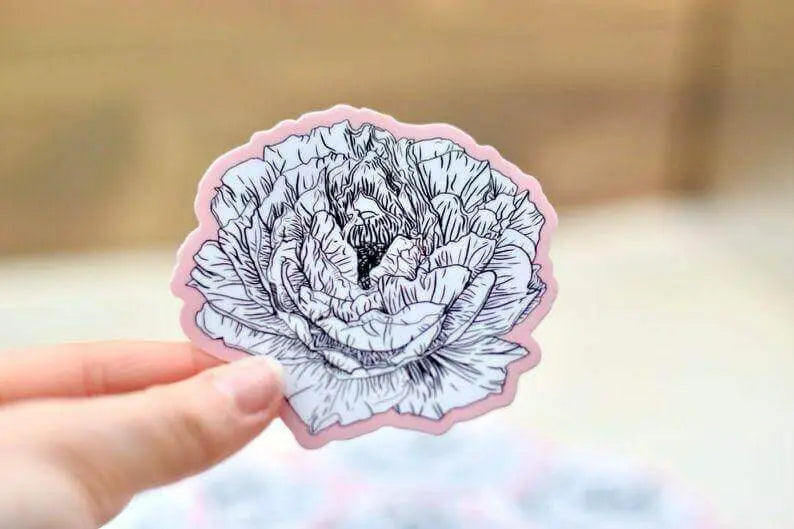 Pink peony flower vinyl sticker by Winks Design Studio, LLC, showcasing a vibrant, detailed pink peony blossom on a white background.