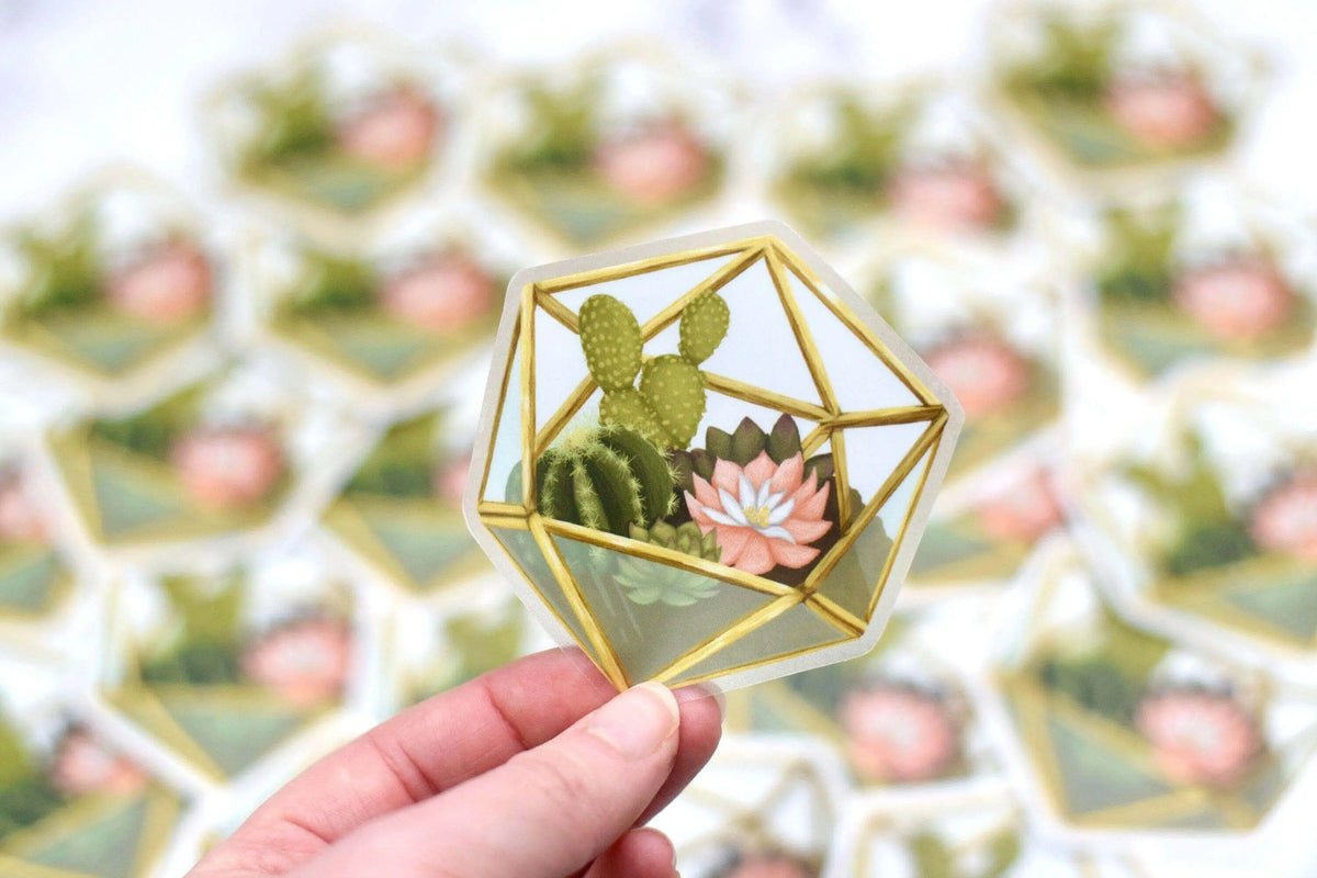 Vinyl succulent terrarium sticker by Winks Design Studio, LLC, featuring a detailed, colorful succulent arrangement for decorating surfaces.
