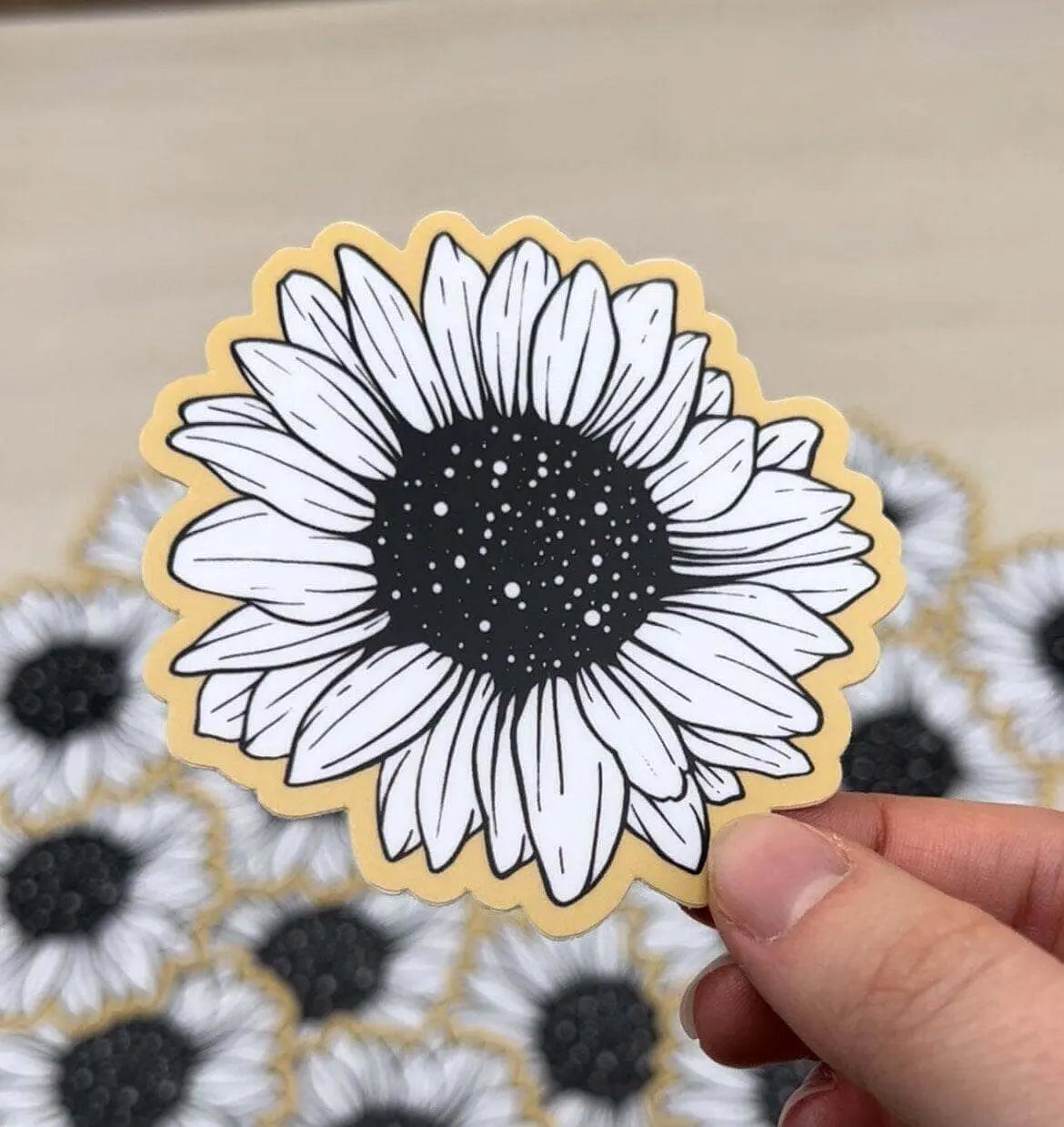 Vinyl sunflower line drawing sticker by Winks Design Studio, LLC, featuring a detailed floral design on a clear background.