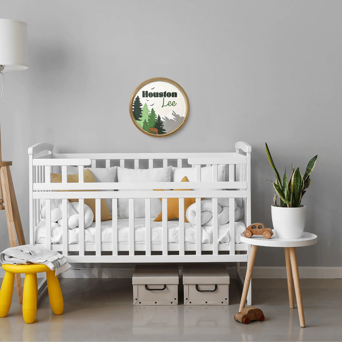 Woodland Creatures Nursery Sign wall art by Winks Design Studio, LLC, featuring handprinted woodland animals in a round design, 11 7/8" diameter.