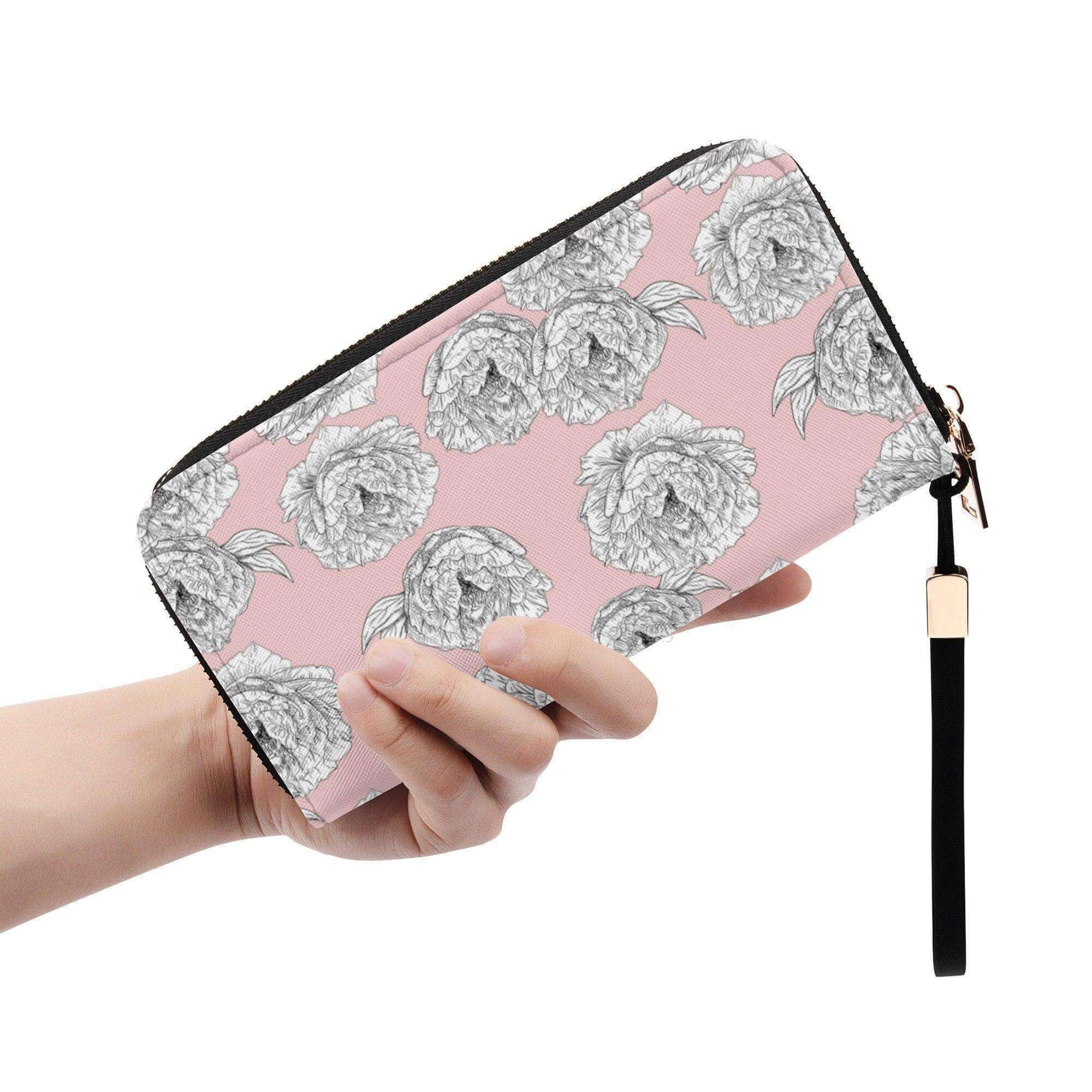 Pink peony flower zipper wallet by Winks Design Studio, LLC featuring a floral design on a compact wallet.