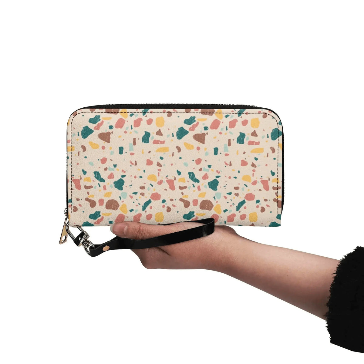 Winks Design Studio LLC terrazzo wallet with colorful speckled design and compact, sleek leather construction.
